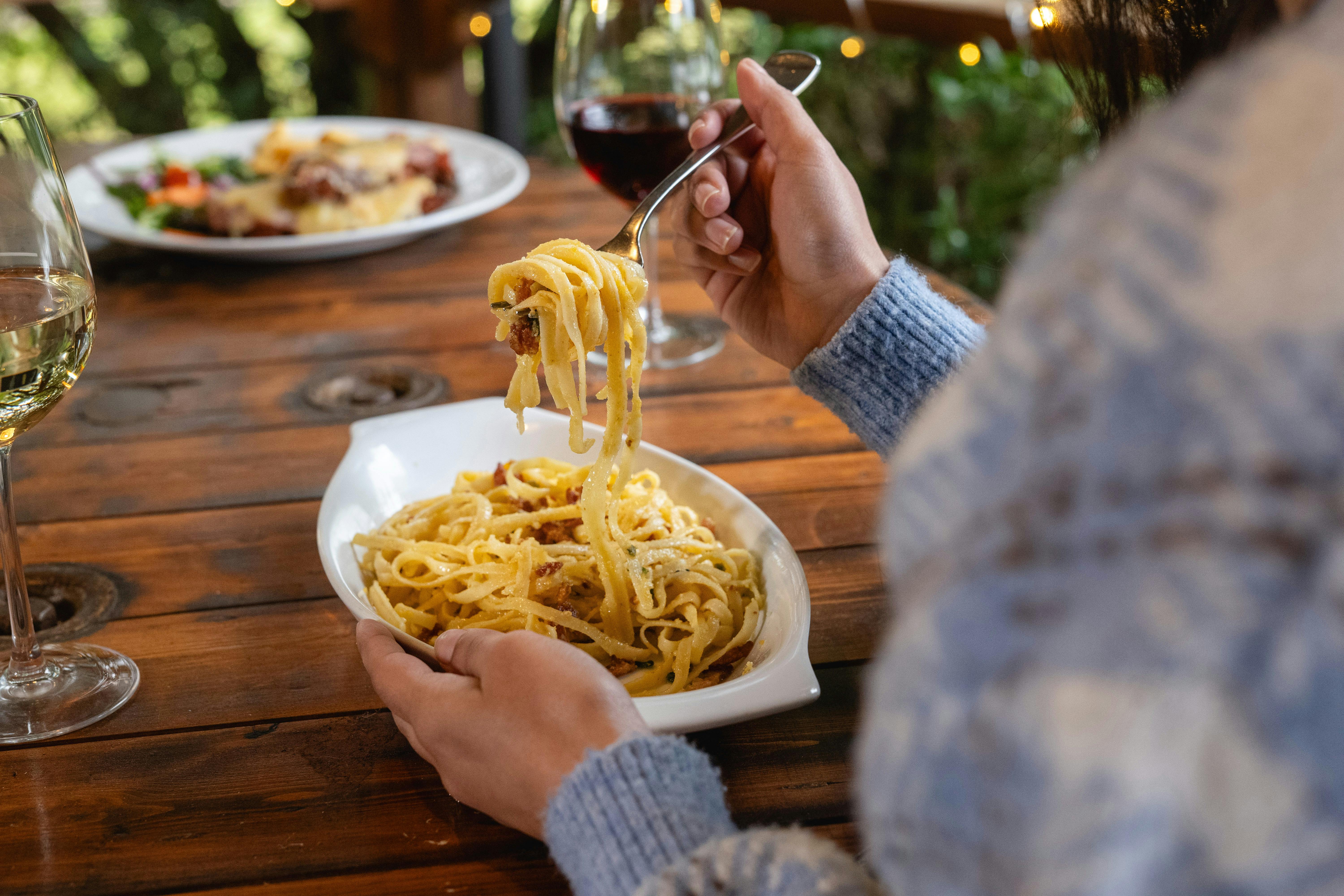 Enjoy a delectable meal at Maydena Eats, featuring freshly made pasta and fine wine.