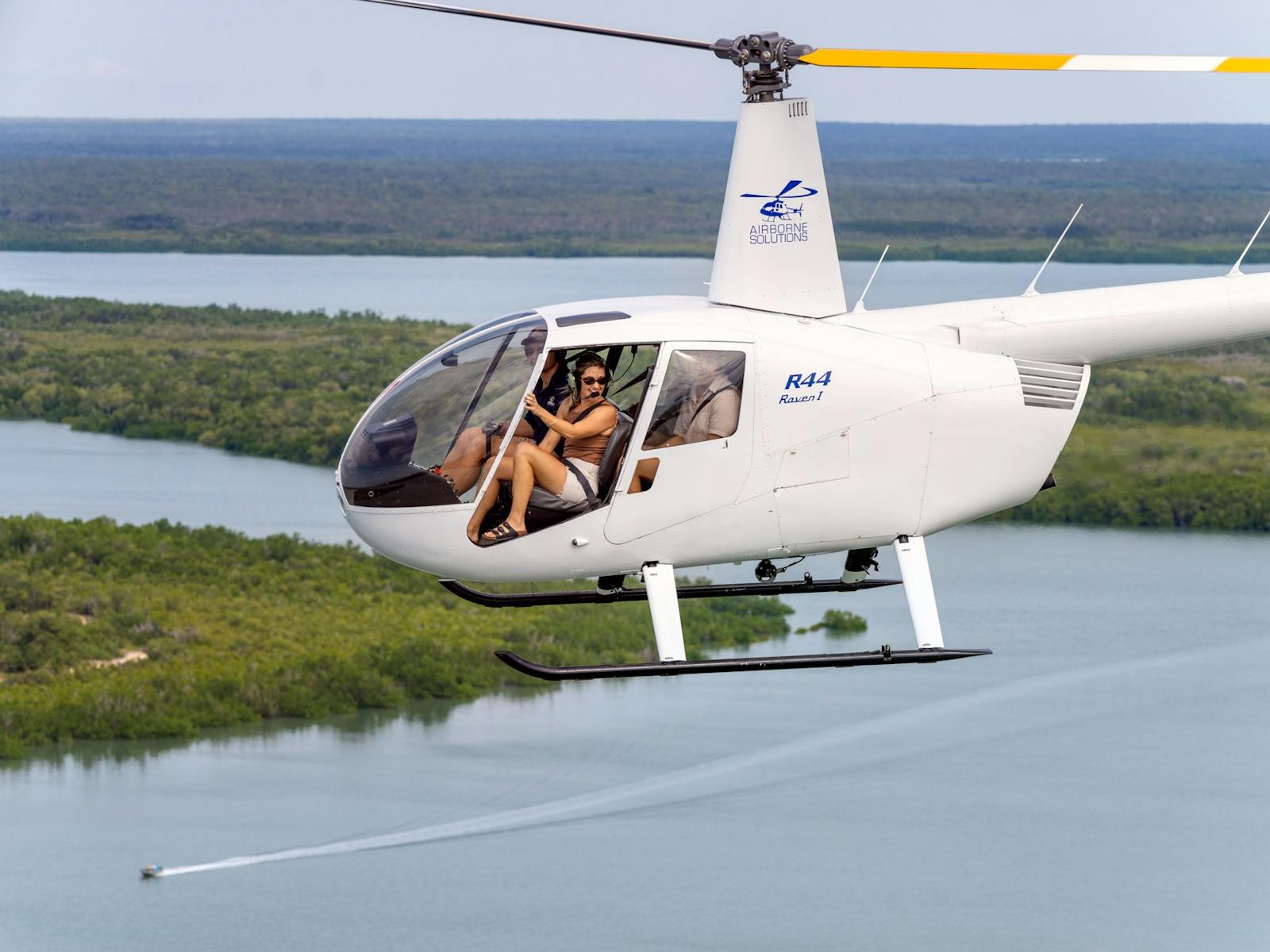 Aerial Photo of people in helicopter over Darwin Darwin inlets