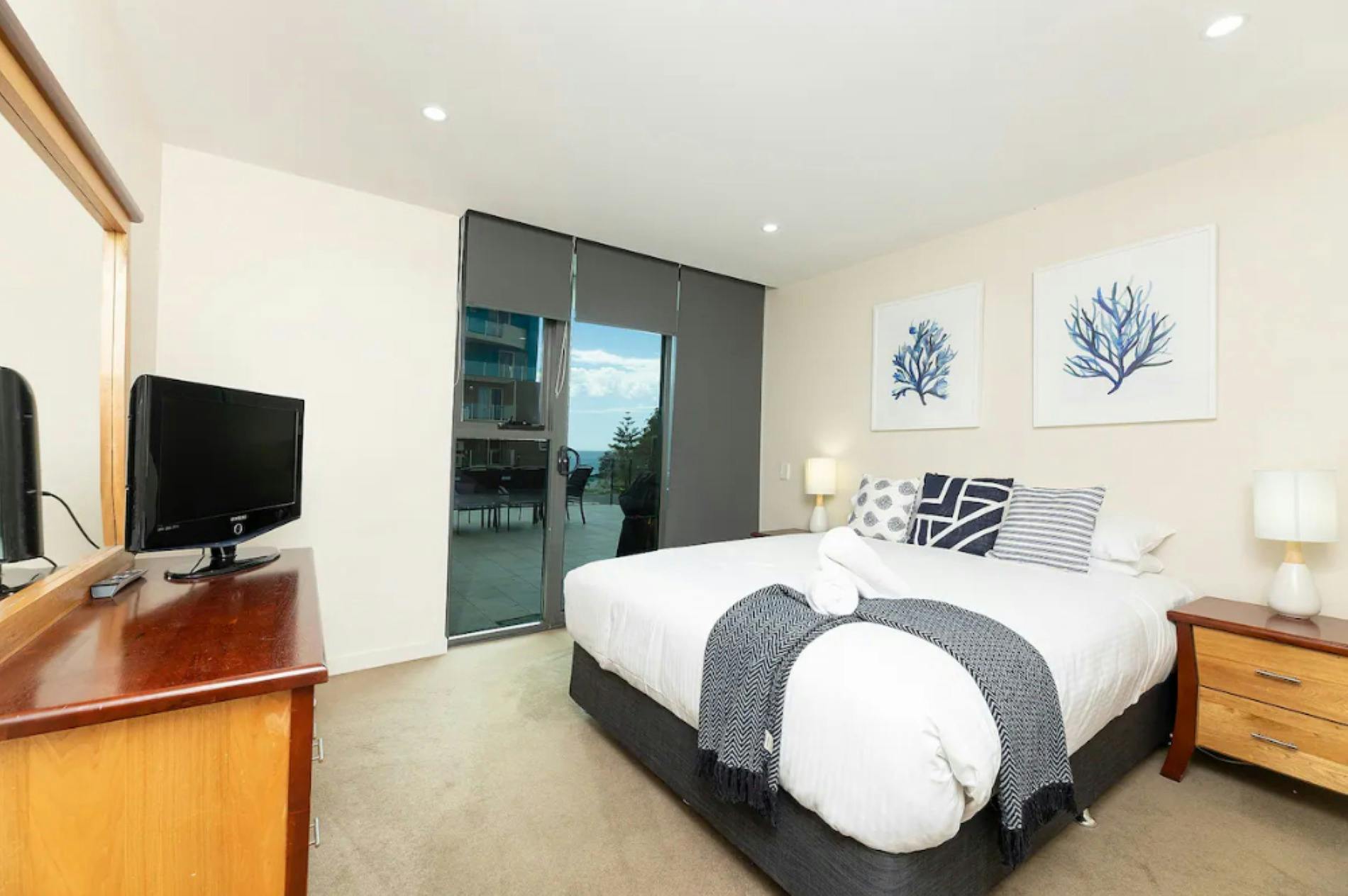 Master bedroom with Queen bed and TV