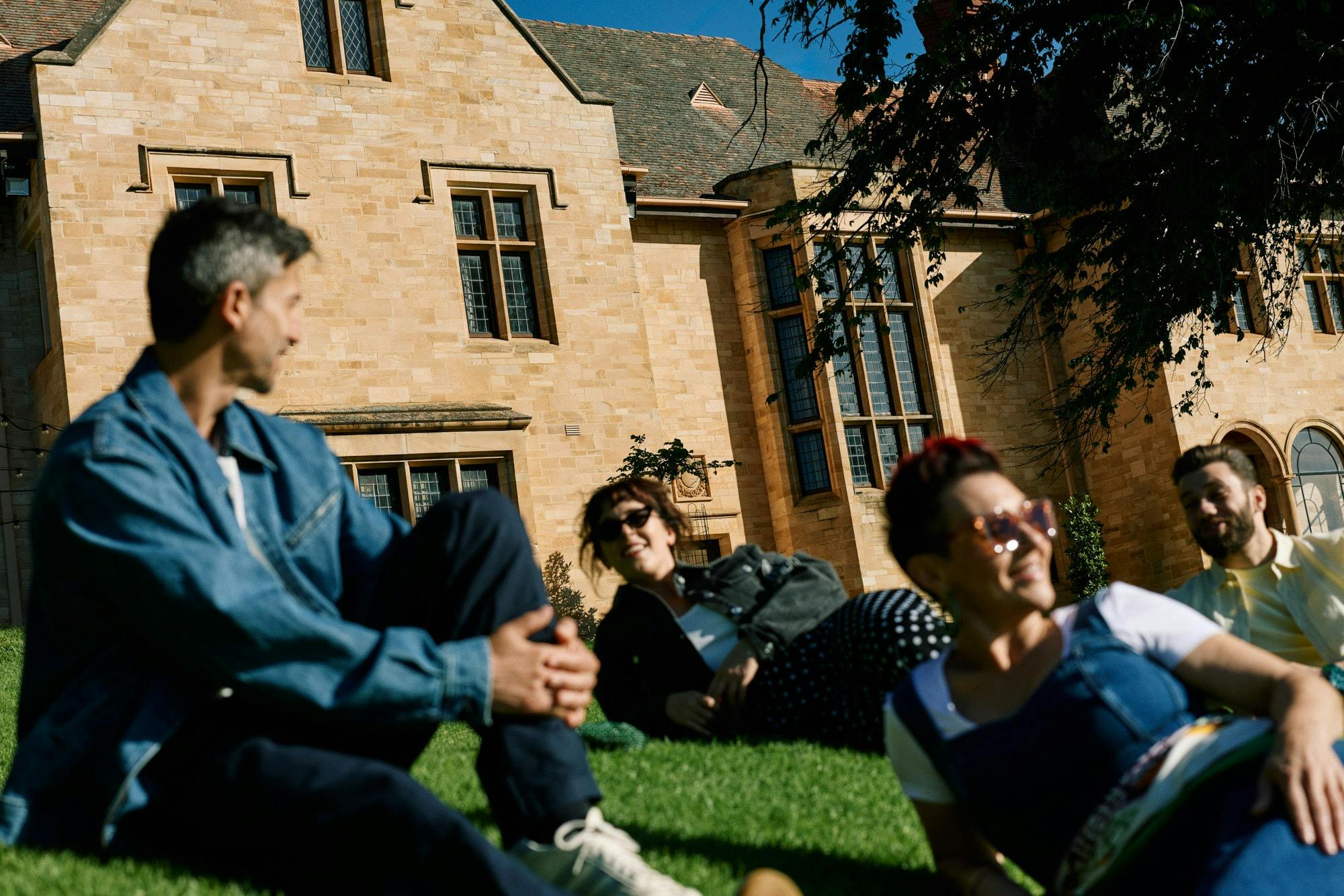 People relaxing on Carrick Hill lawns