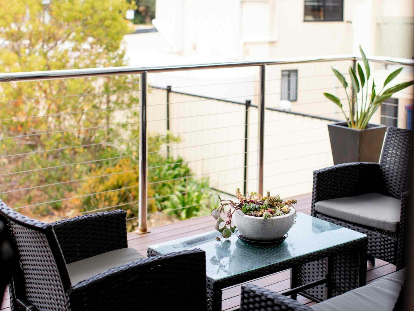 Furnished balcony at Binalong Bay Beach House in Binalong Bay, Tasmania.