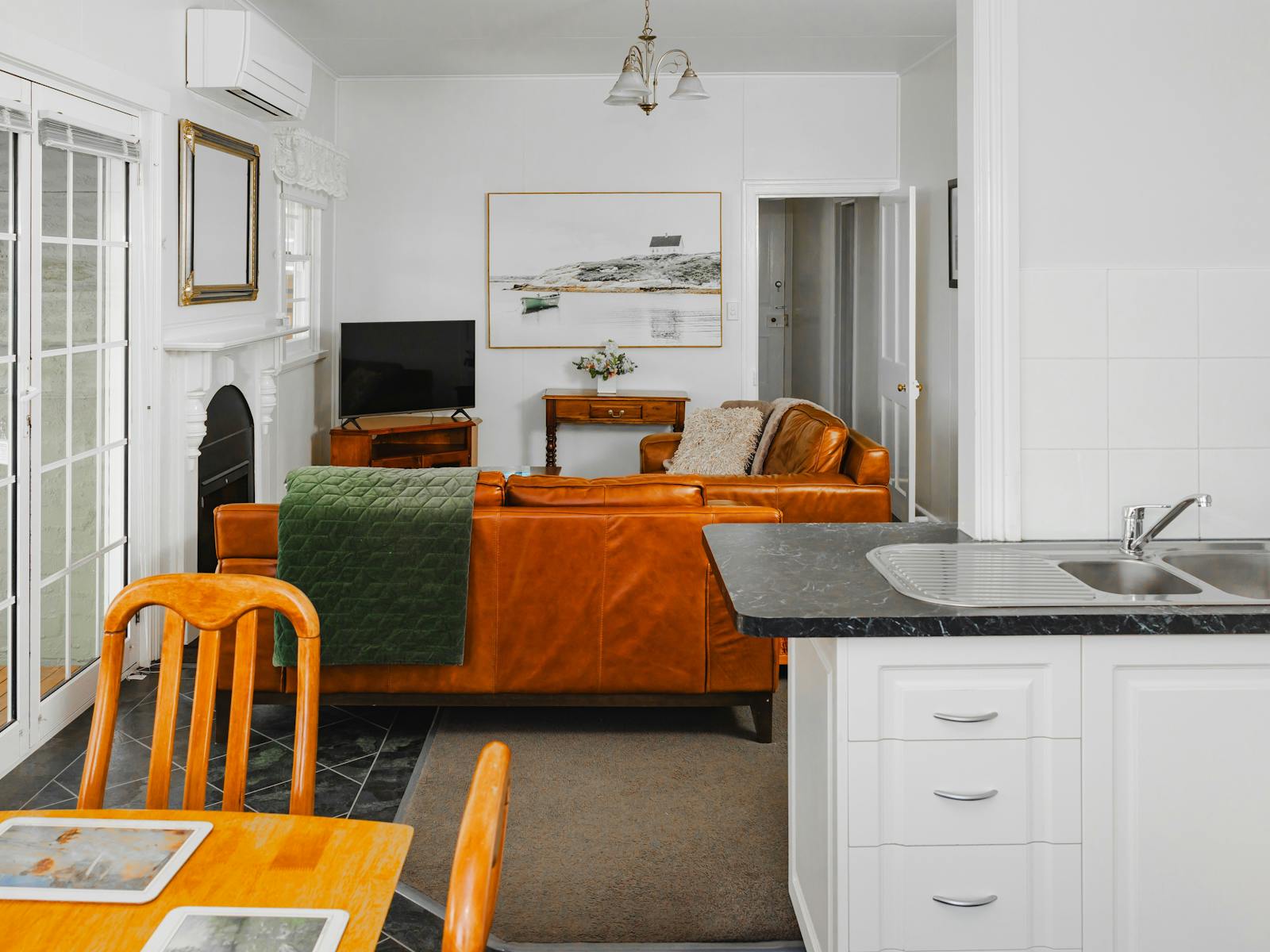 Large well equipped kitchen, dining area for 6 people, comfortable lounge area