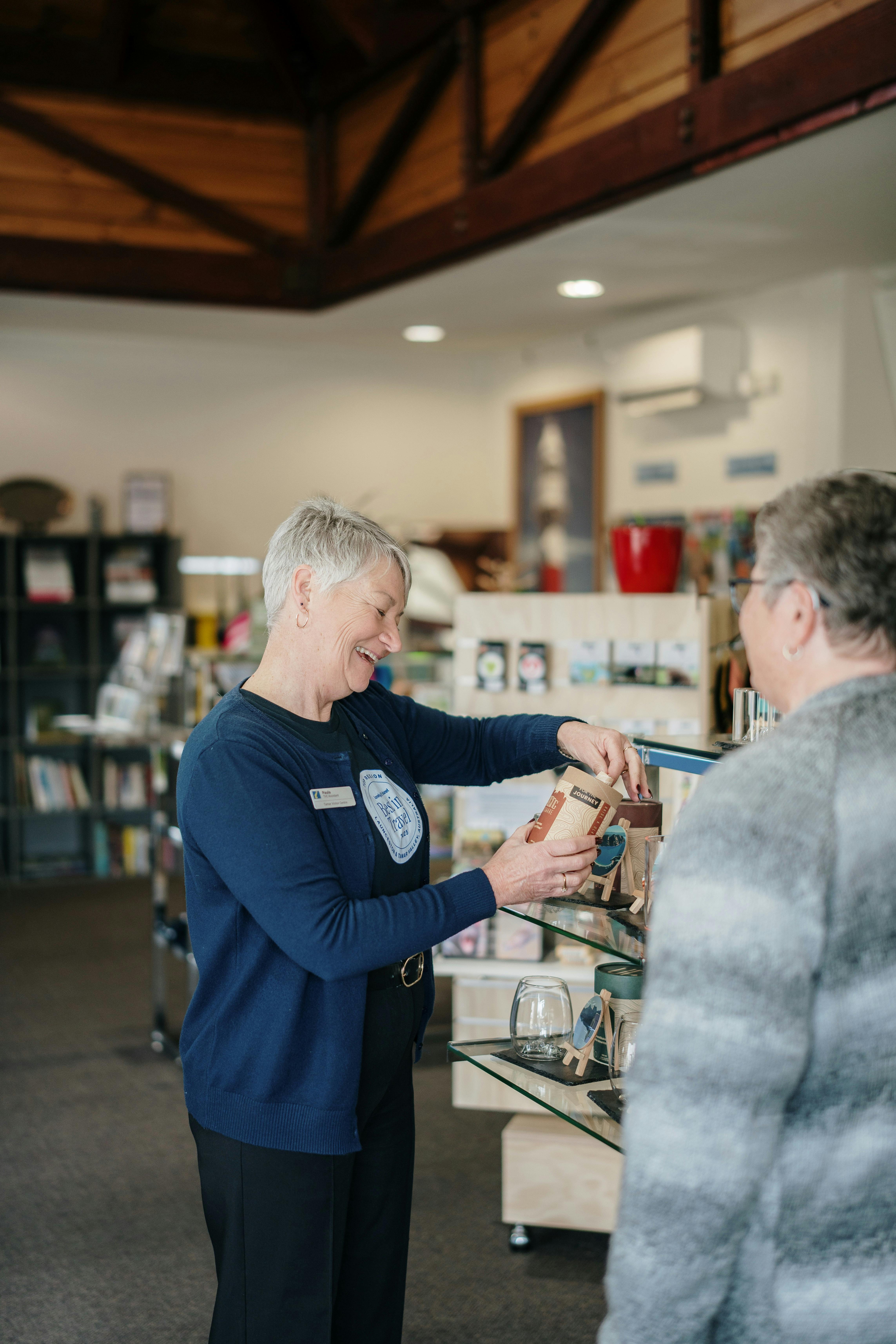 Staff helping with retail purchase