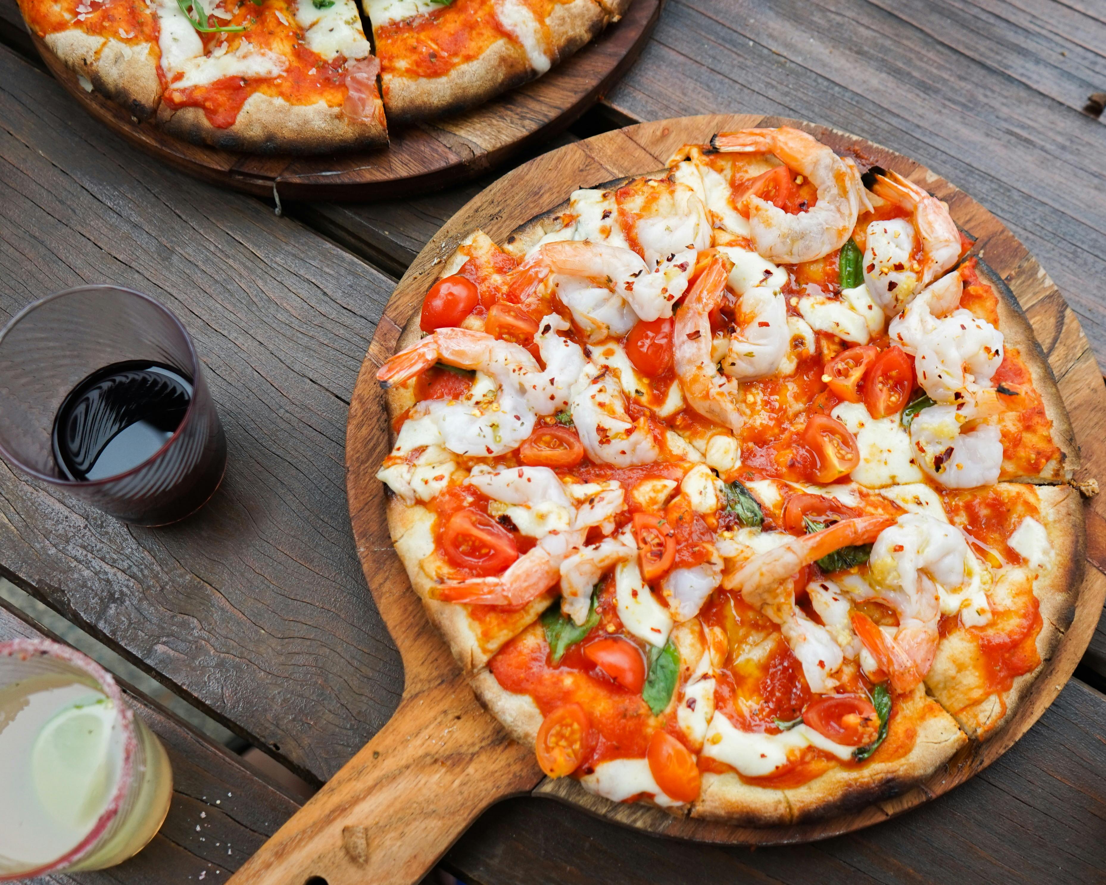 Margarita and prawn pizza