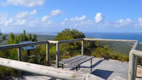 Timber viewing deck, seat and ocean views.