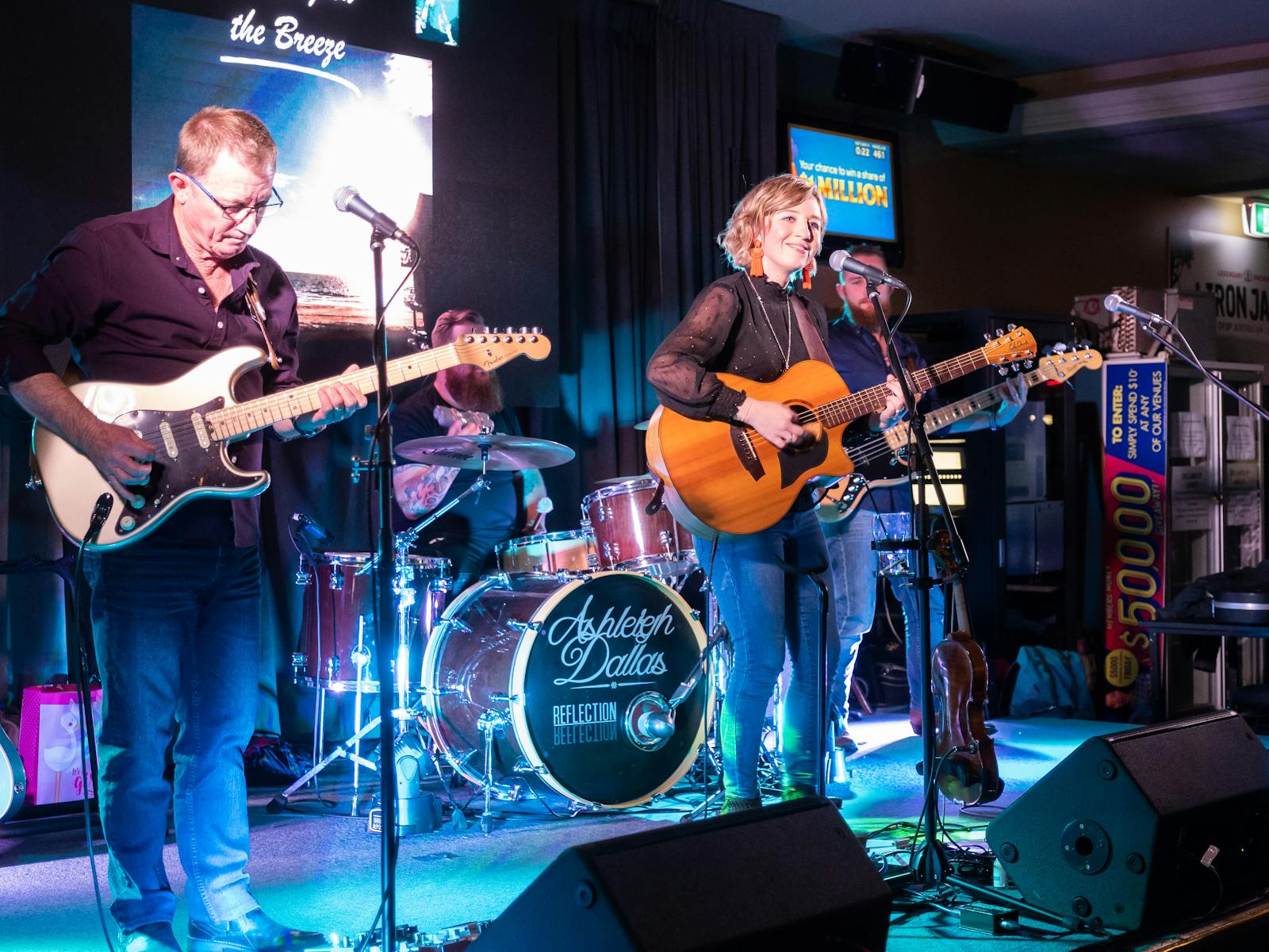 Ashleigh Dallas and band on stage