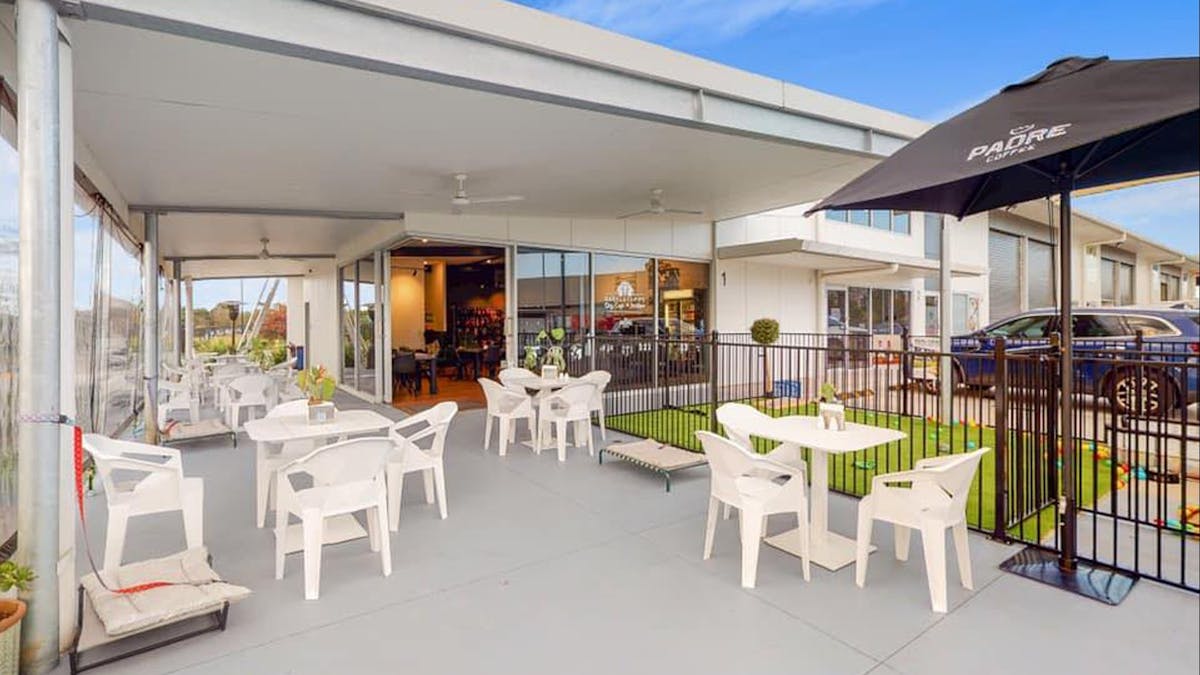 Outside dining area and puppy playpen