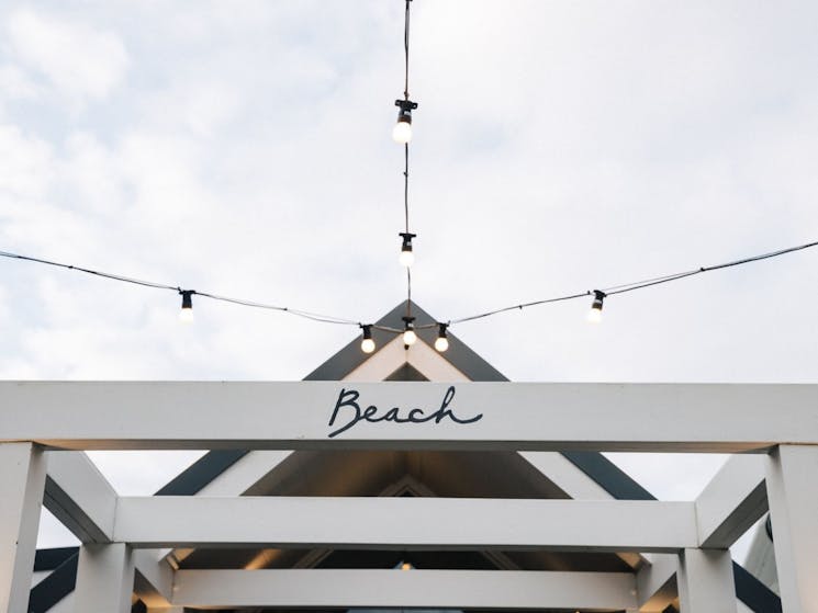 Restaurant entrance, looking up to blue skies