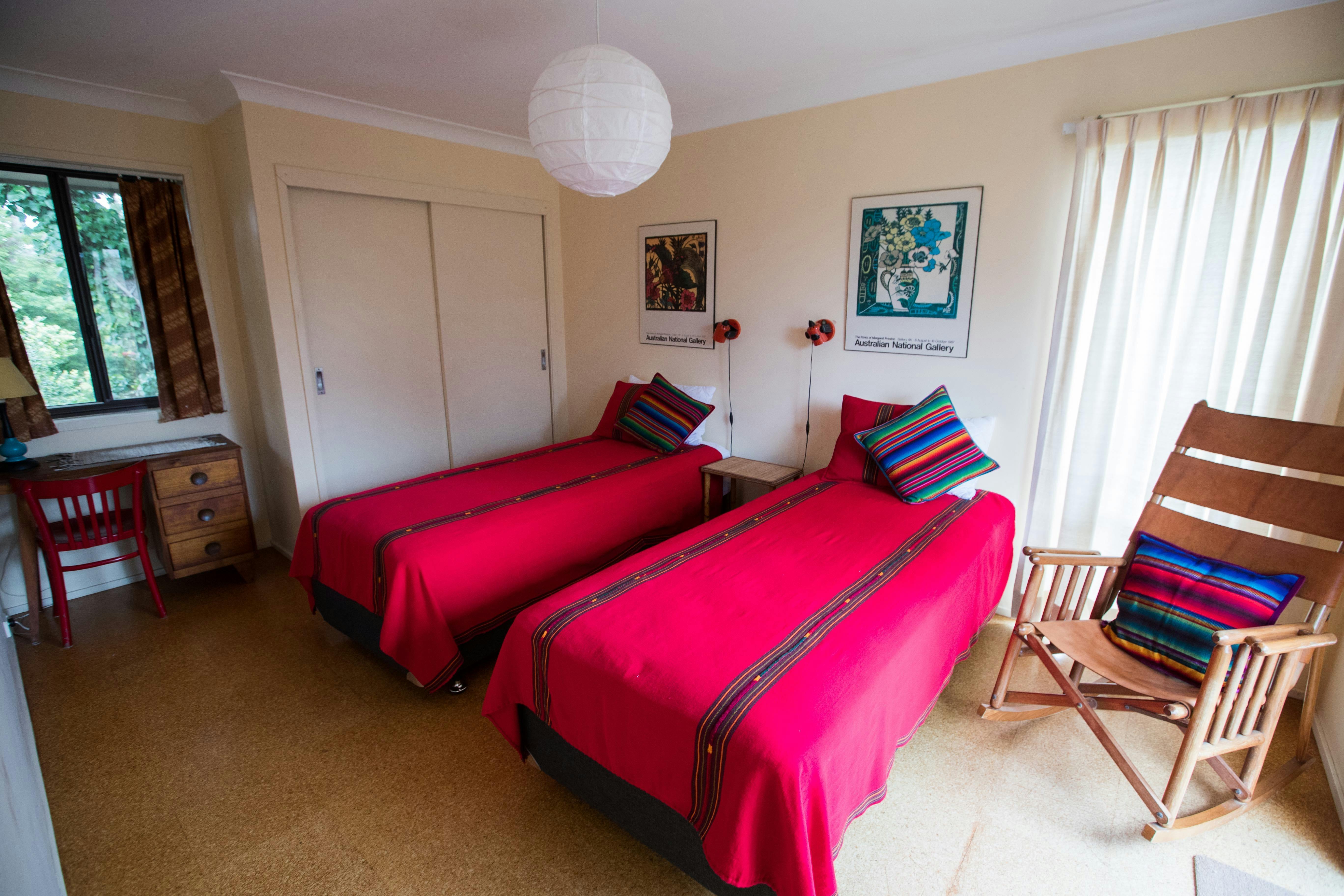 End bedroom with two king singles