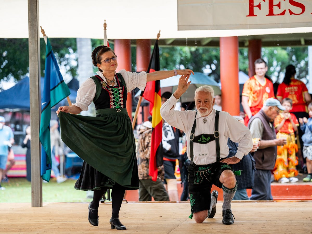 A man and woman perform a traditional swiss/german dance at the  Mareeba Multicultural Festival.