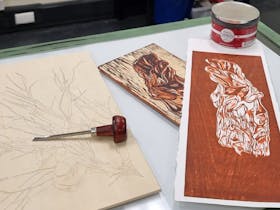 woodcut blocks, ink and carving tools