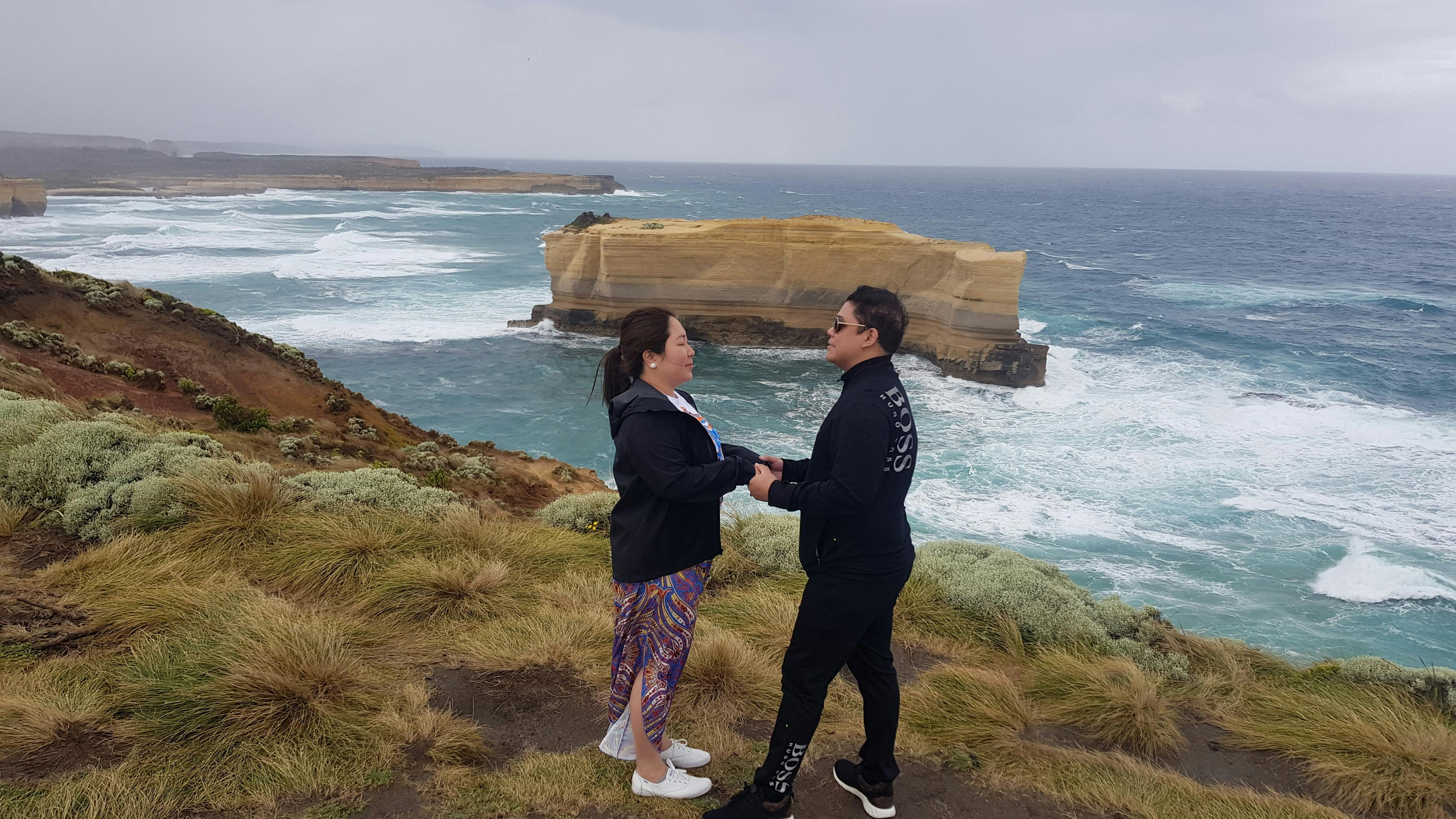 Honeymooner on  rugged coastline