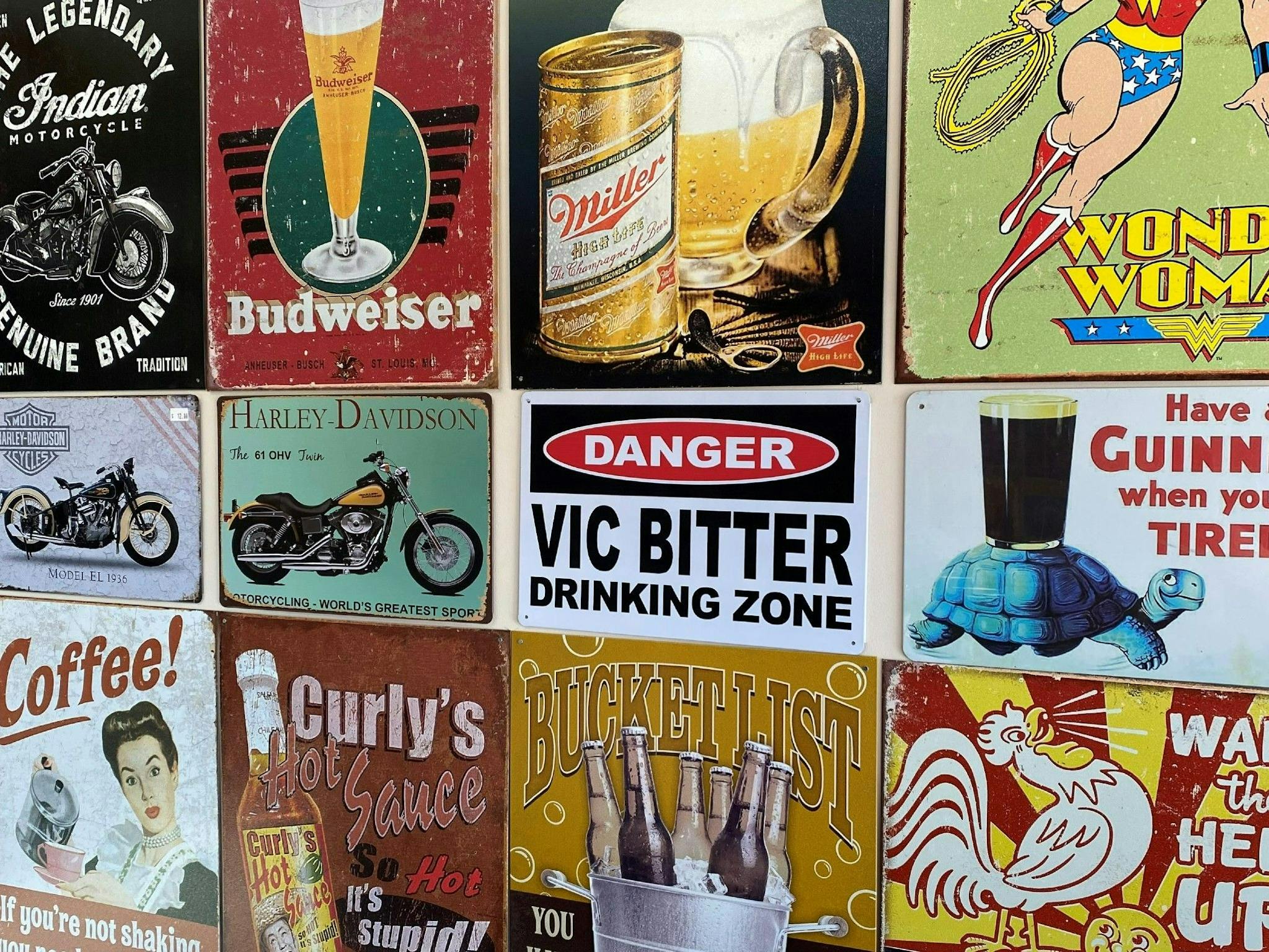 Wall of signs which are all for sale