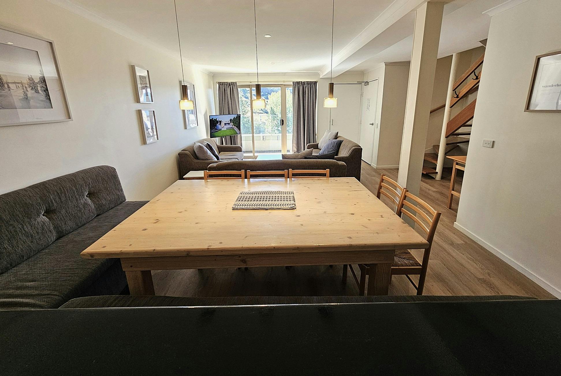 Common area with large table and chairs