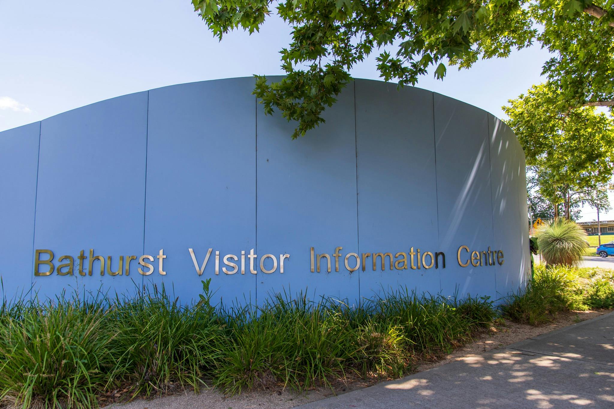 Visitor Information Sign with hiding dinosaur