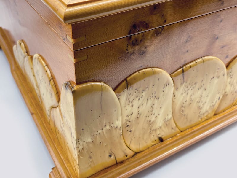 Corner of a box with highly pateerned Huon pine and King Billy pine detail
