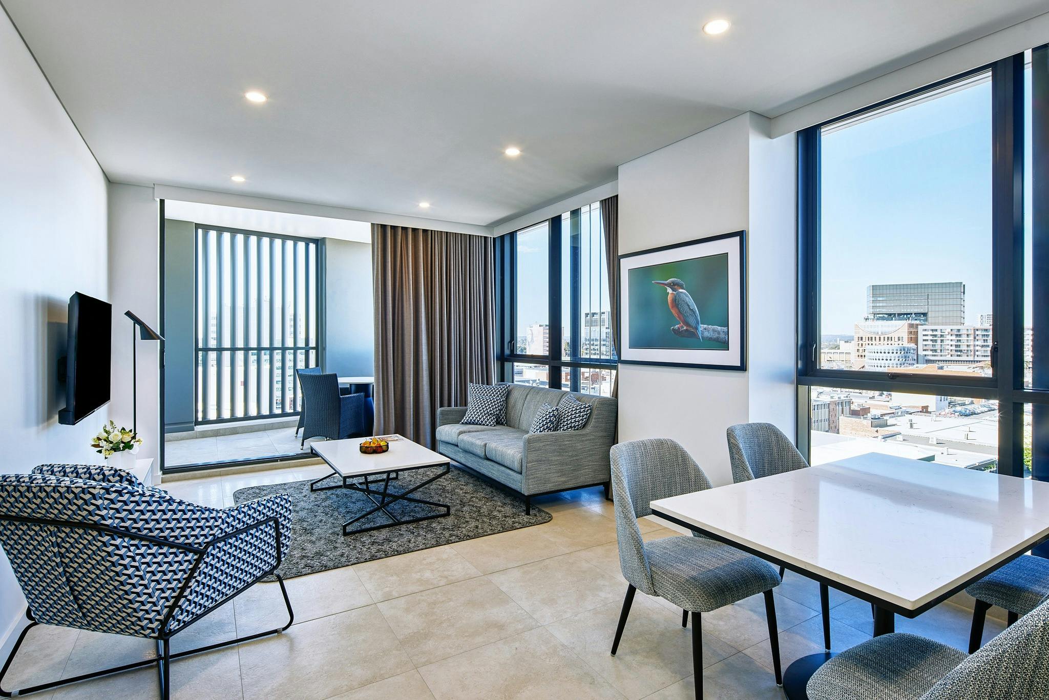 Living, dining and balcony area