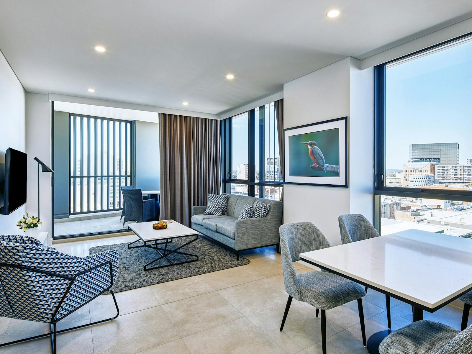 Living, dining and balcony area