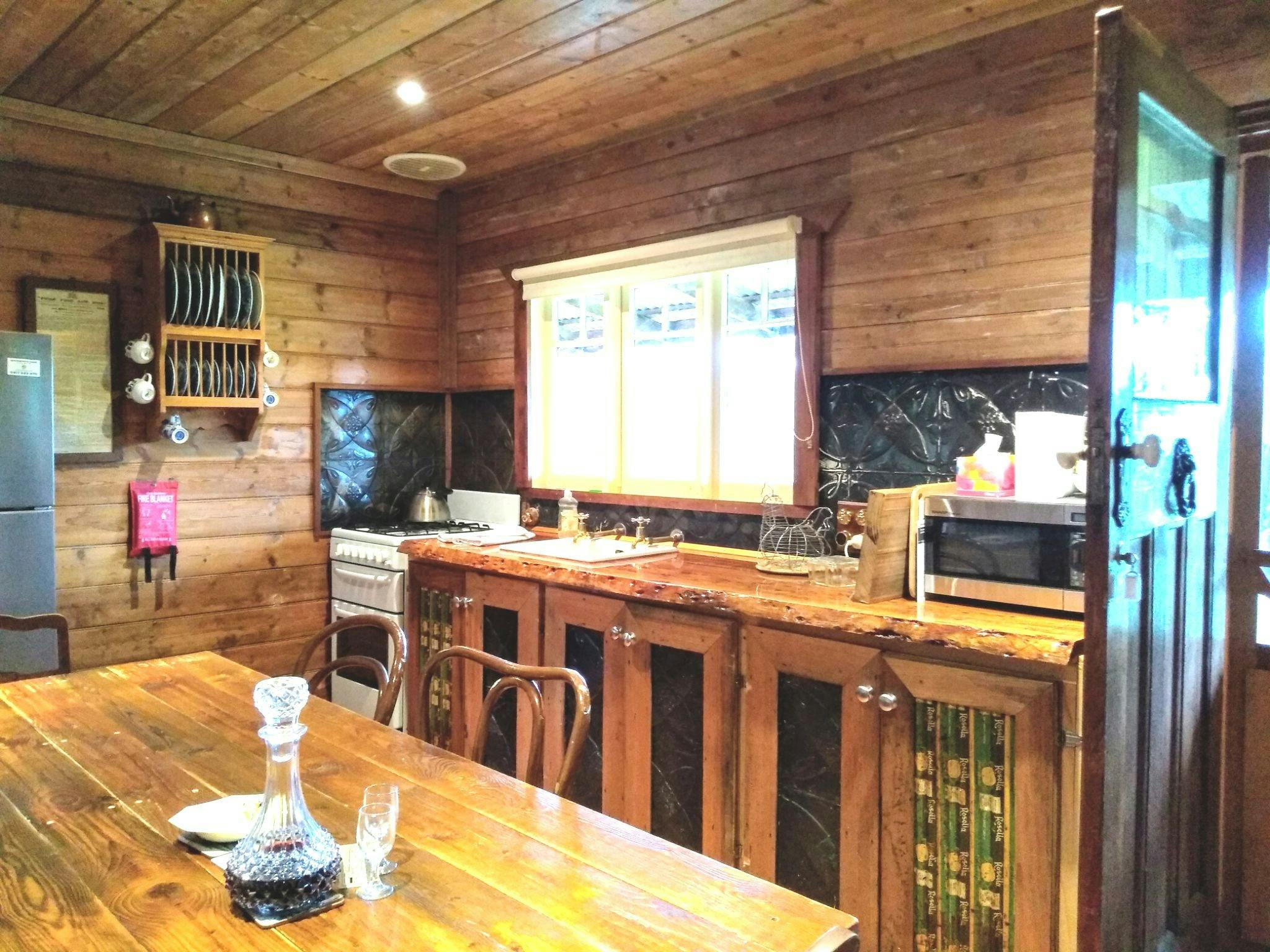 Orchard Cottage full kitchen in beautiful older country style with gorgeous woodwork