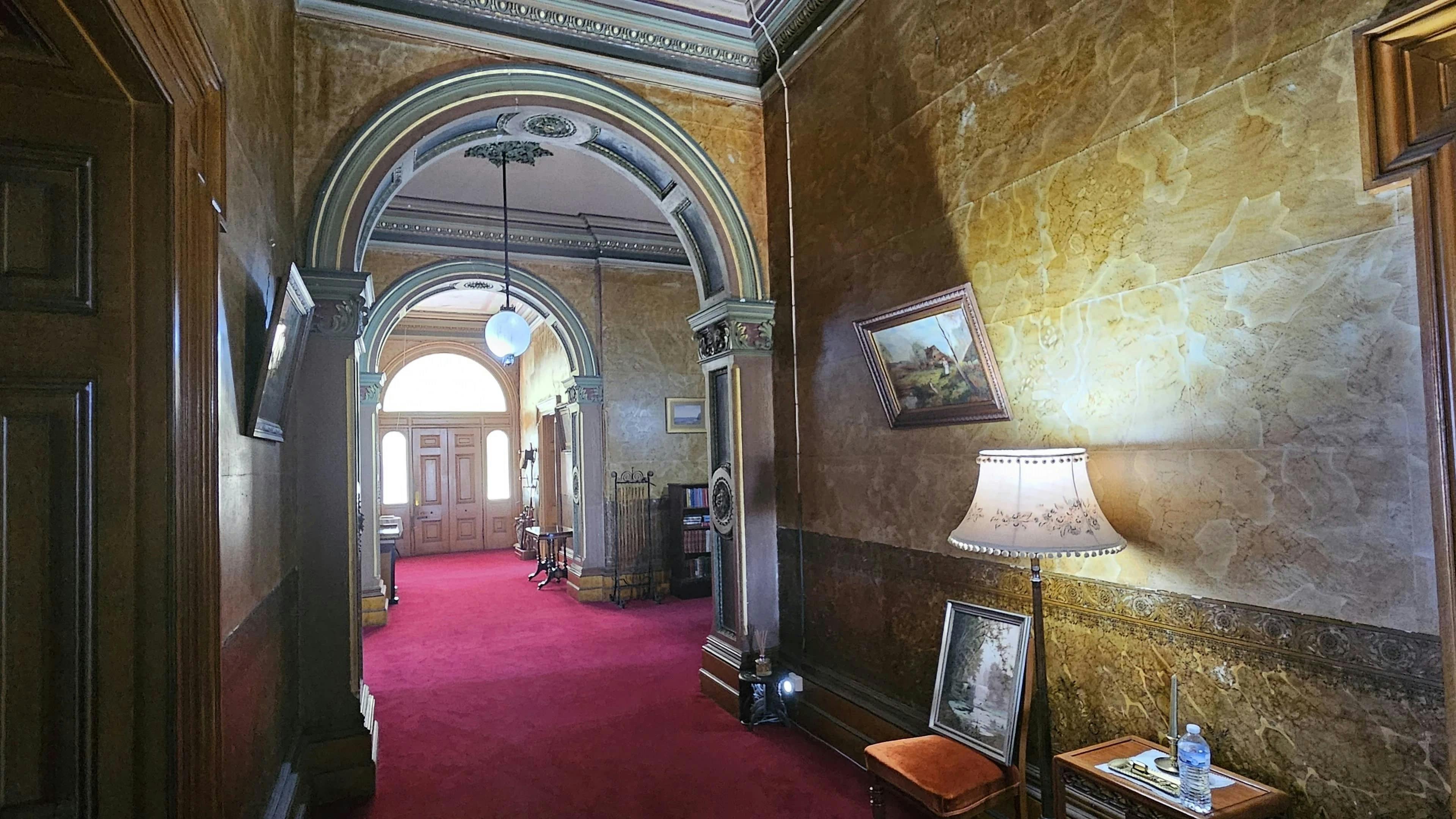 Marbled entrance hallway at Yallum Park leading through to the front door