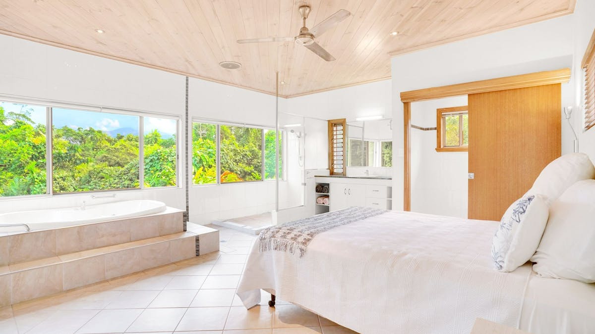Bedroom 1 - ensuite spa and shower with treetop views