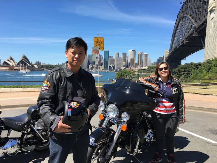 Sydney Opere House and Harbour Bridge are a great backdrop for photos on a harely tour.