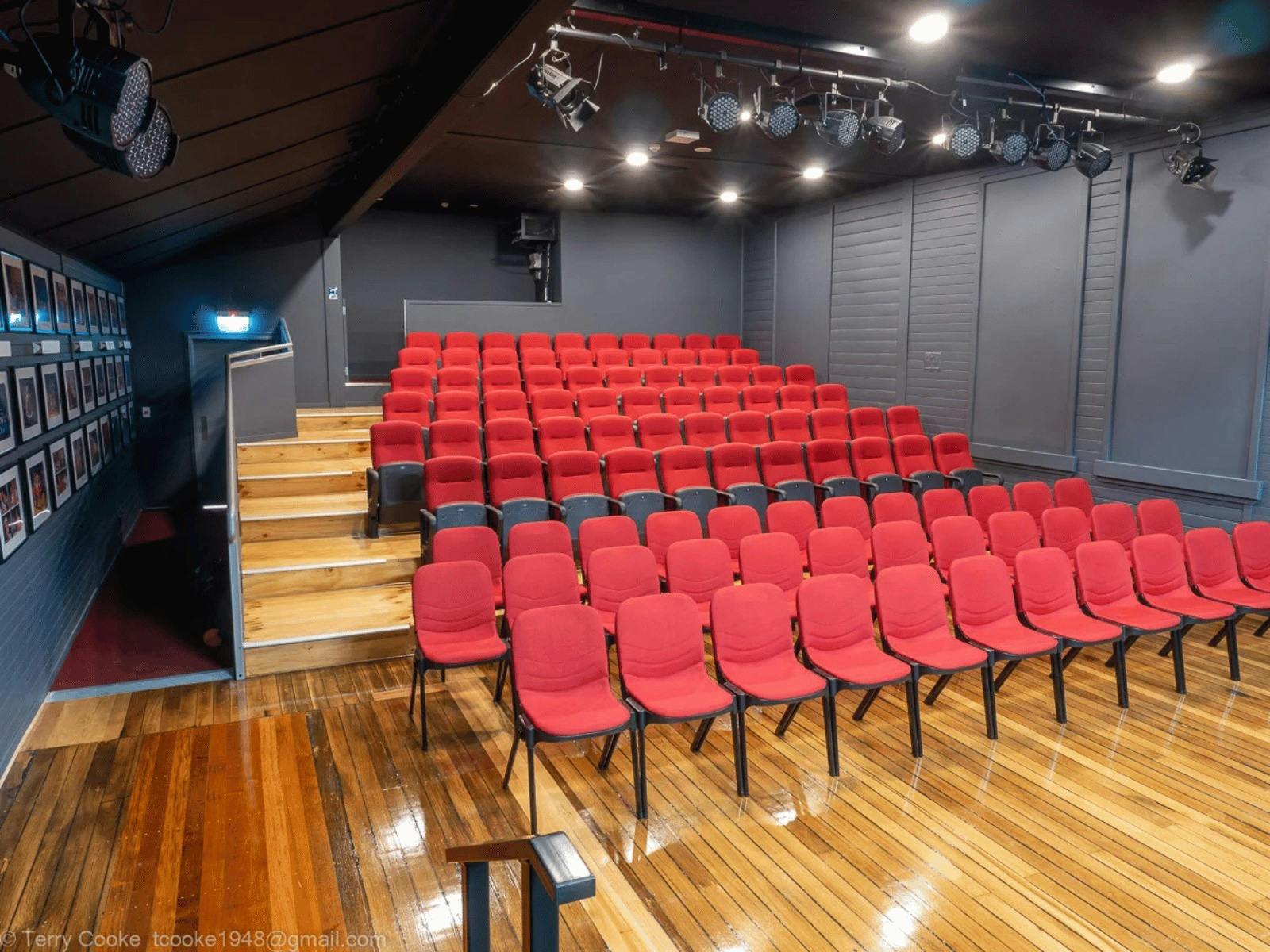 Tired red seat in the theatre