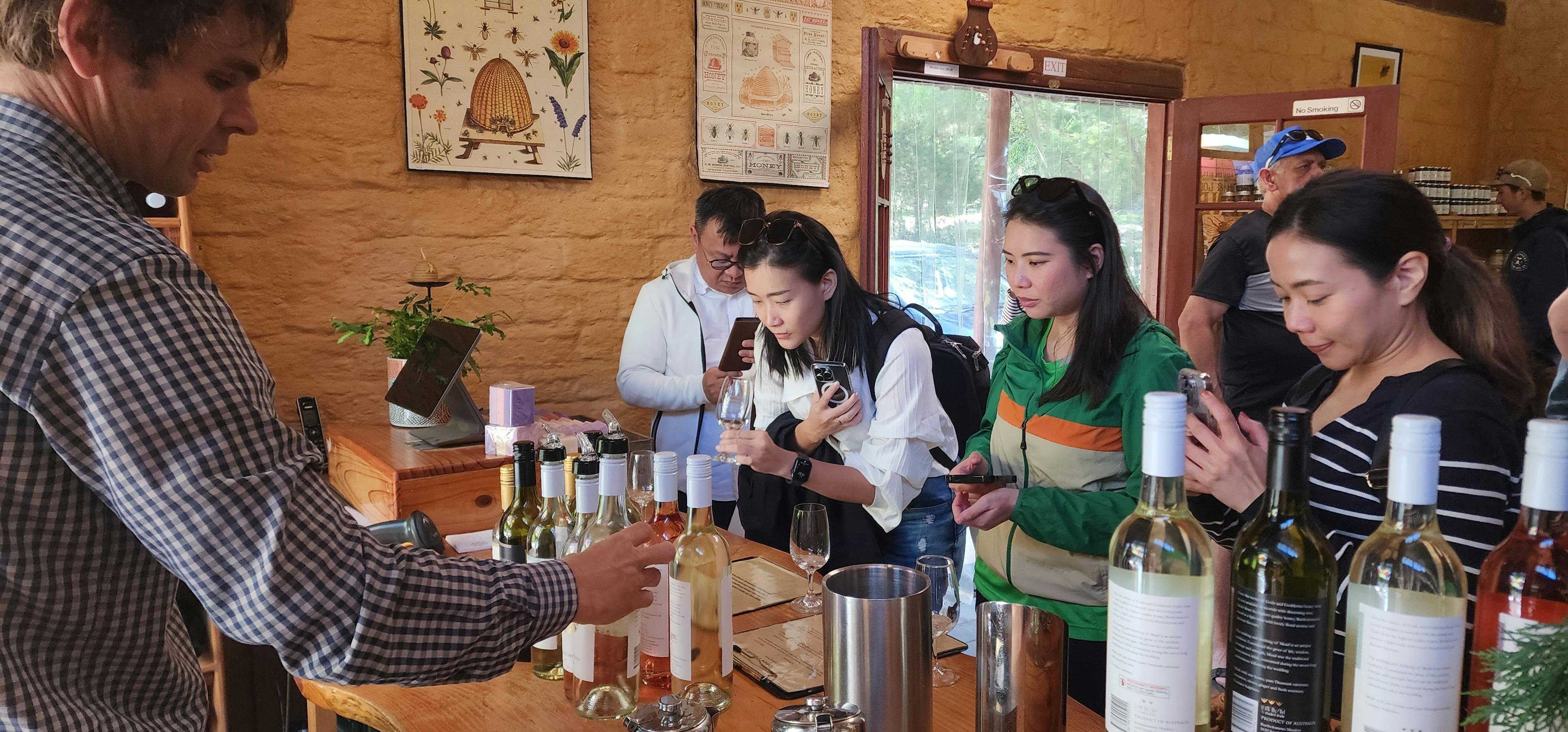 guests tasting from glasses