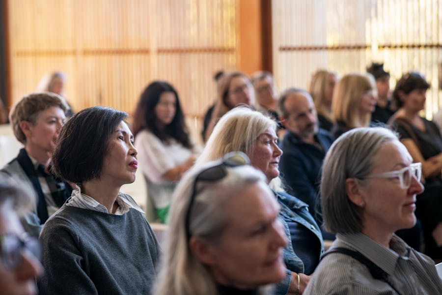 People seated listening to a talk at Bundanon.