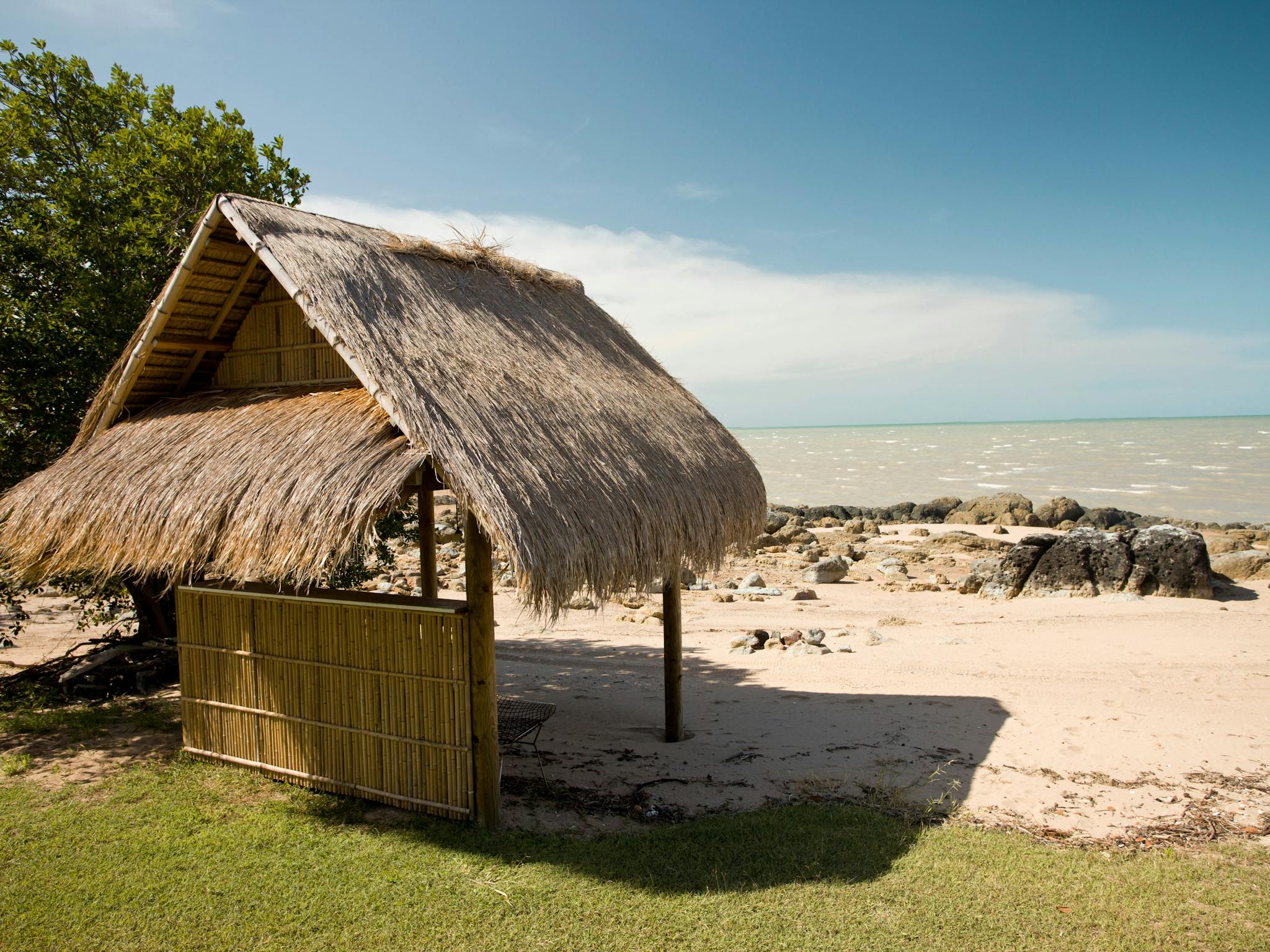 Islander Hut with Clairview beach in the background