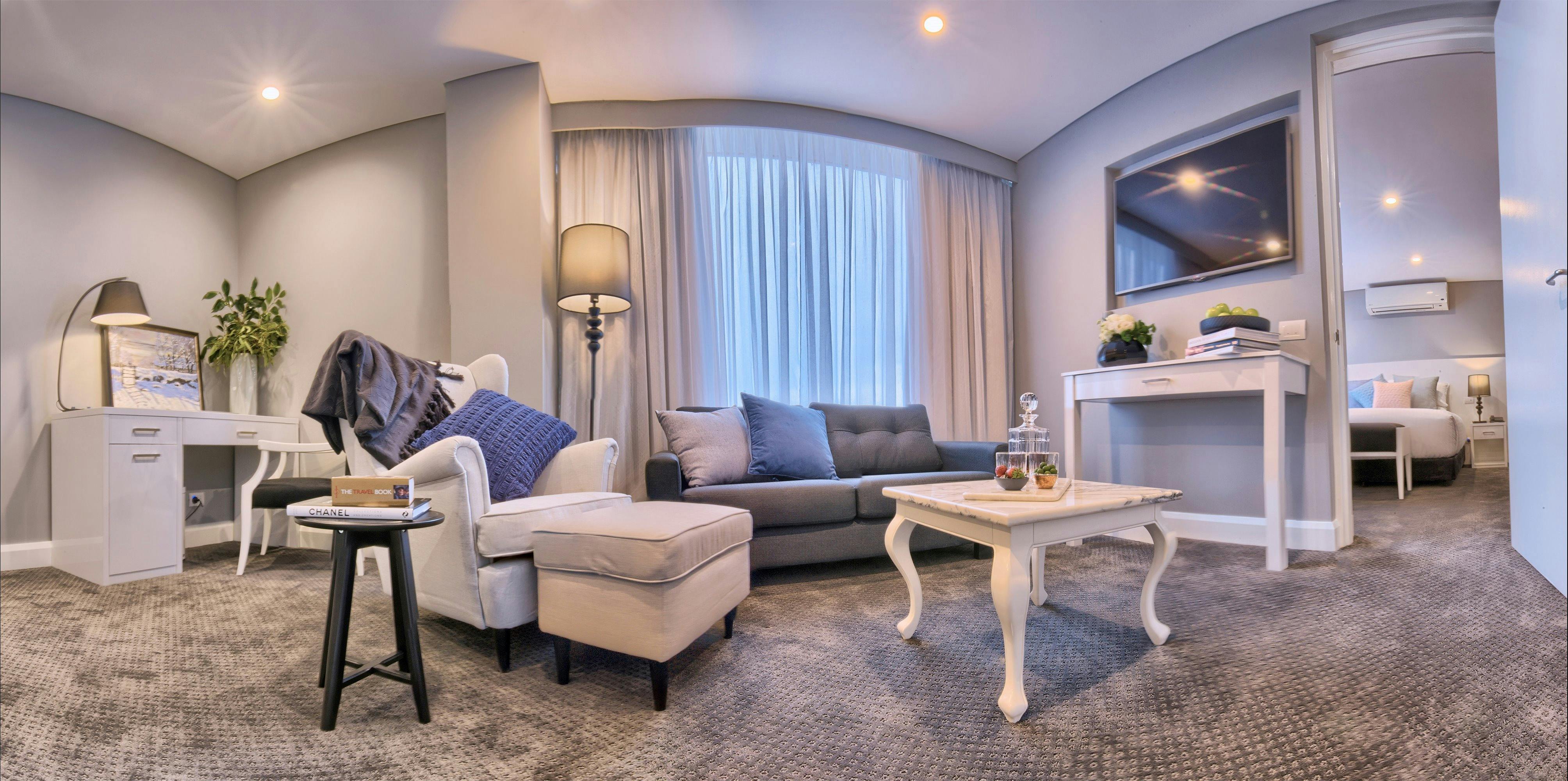 A separate living room of a hotel suite