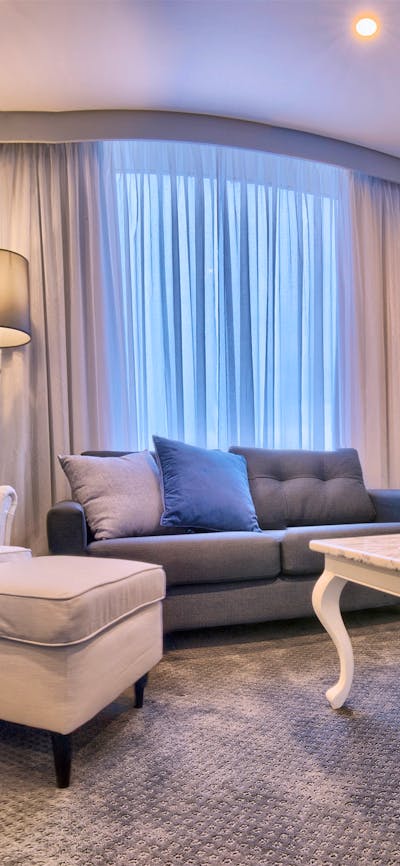 A separate living room of a hotel suite