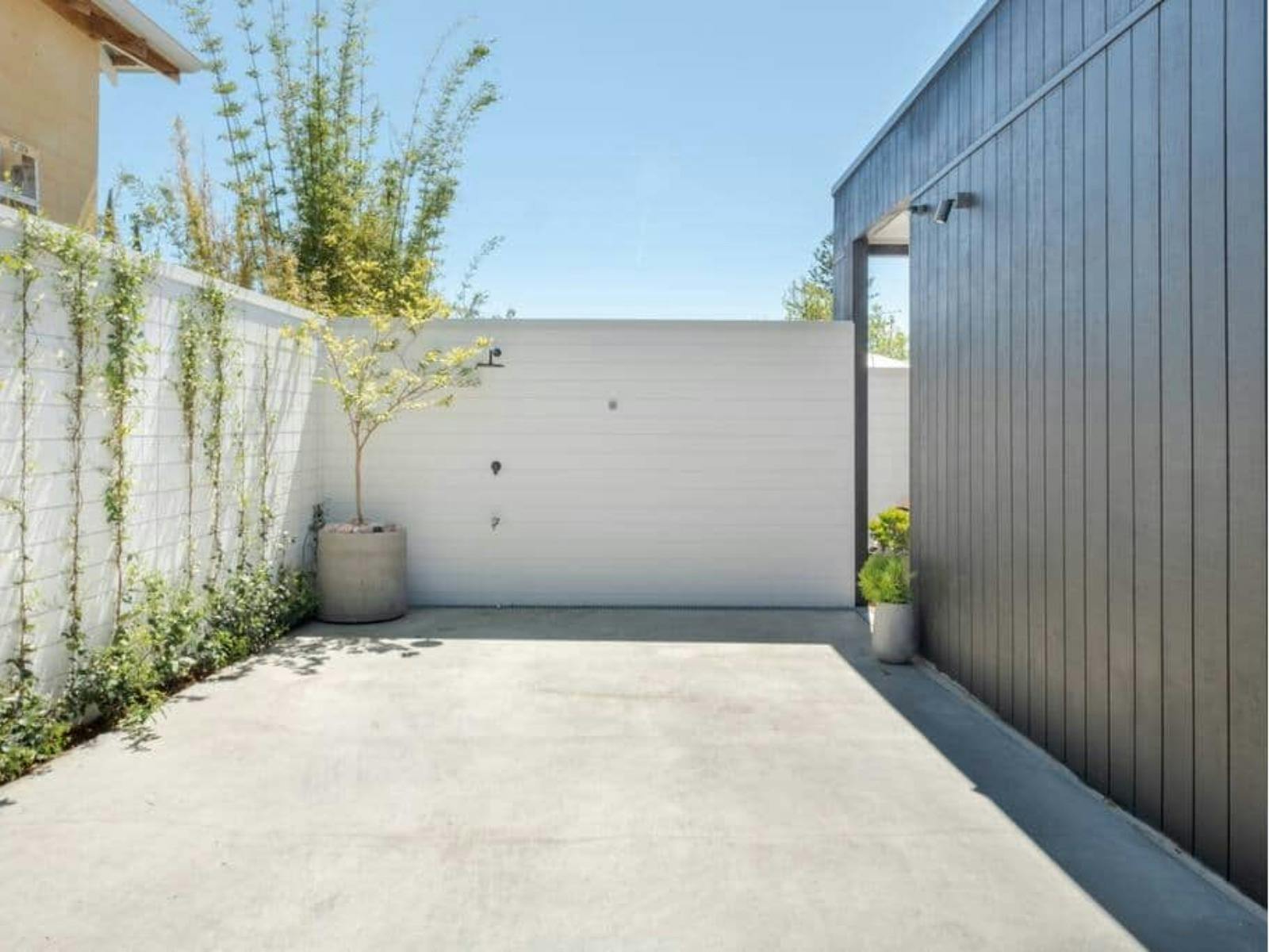 Single carport with secure coded access and electronic gate