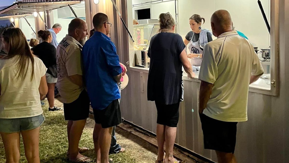 Serving Meals at Julia Creek Caravan Park Bush Dinner