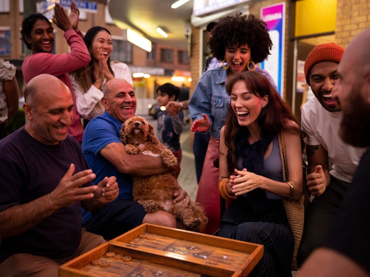 Locals enjoying a game of backgammon in Little India, Harris Park