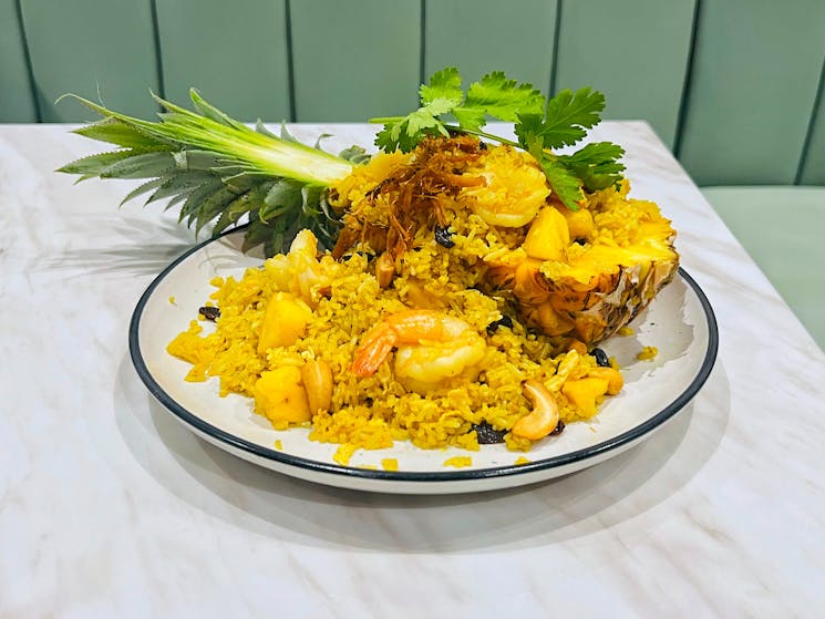 Thai dish with rice, seafood and pineapple