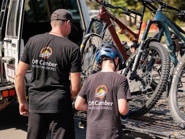Tying down bikes on MTB shuttle trailer Tying down bikes on MTB shuttle trailer