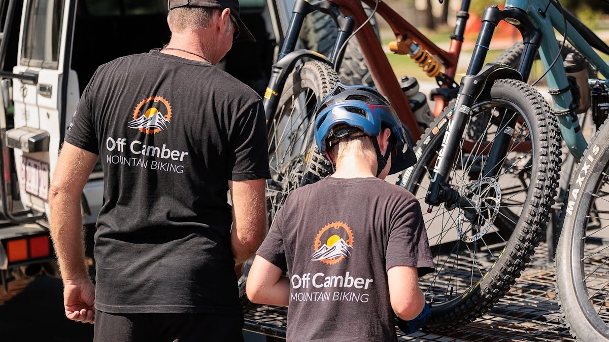 Tying down bikes on MTB shuttle trailer