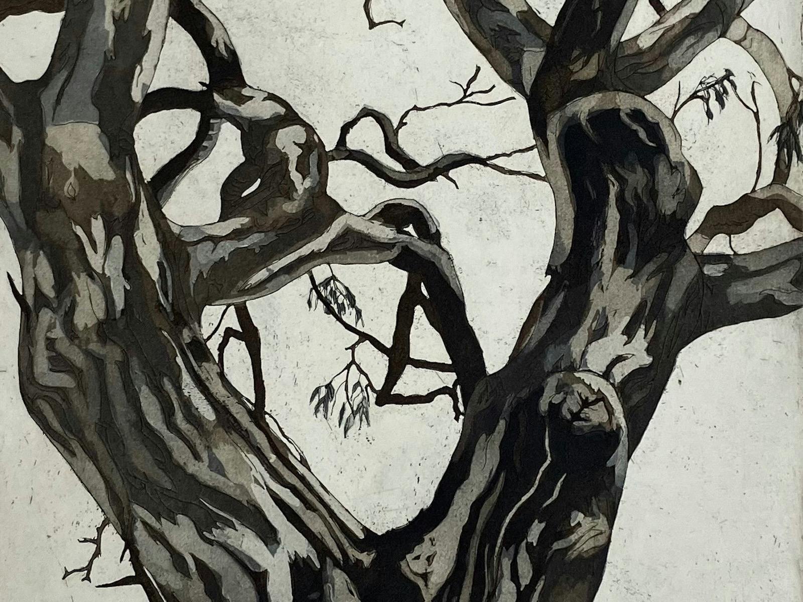 Black and white etching of a tree