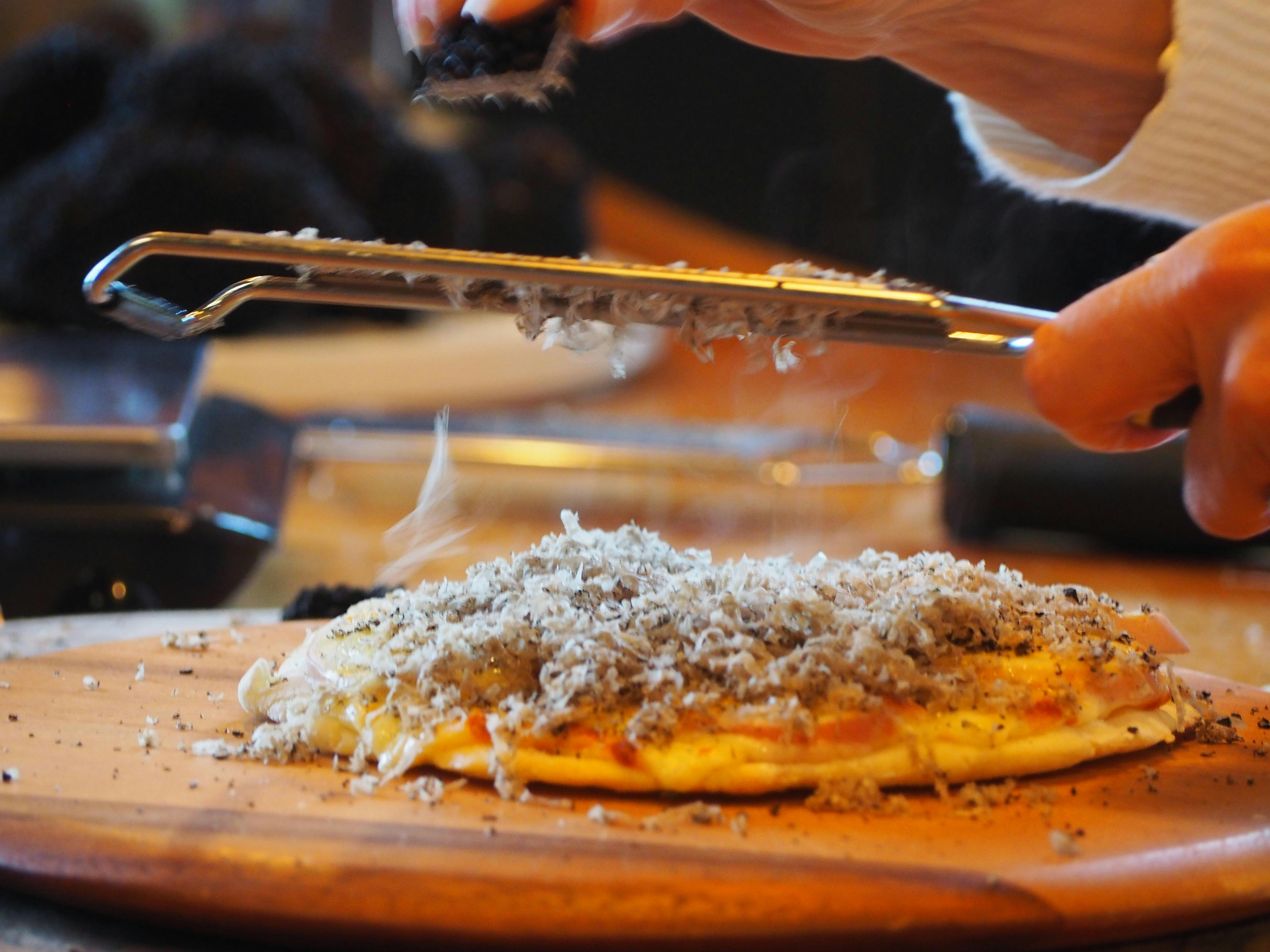 Grate on pizza
