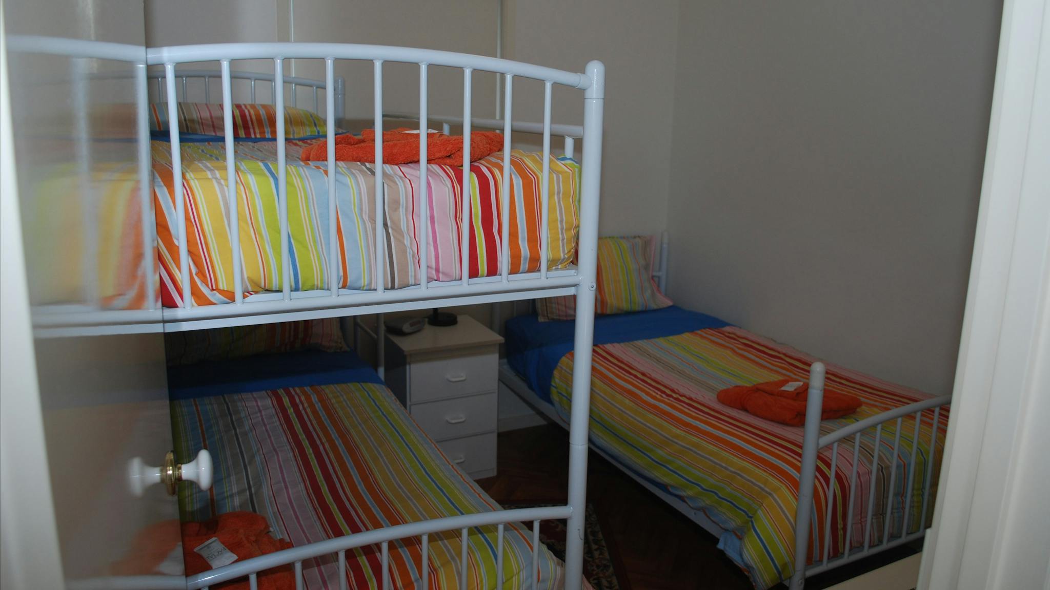 Bedroom with single bed and bunks