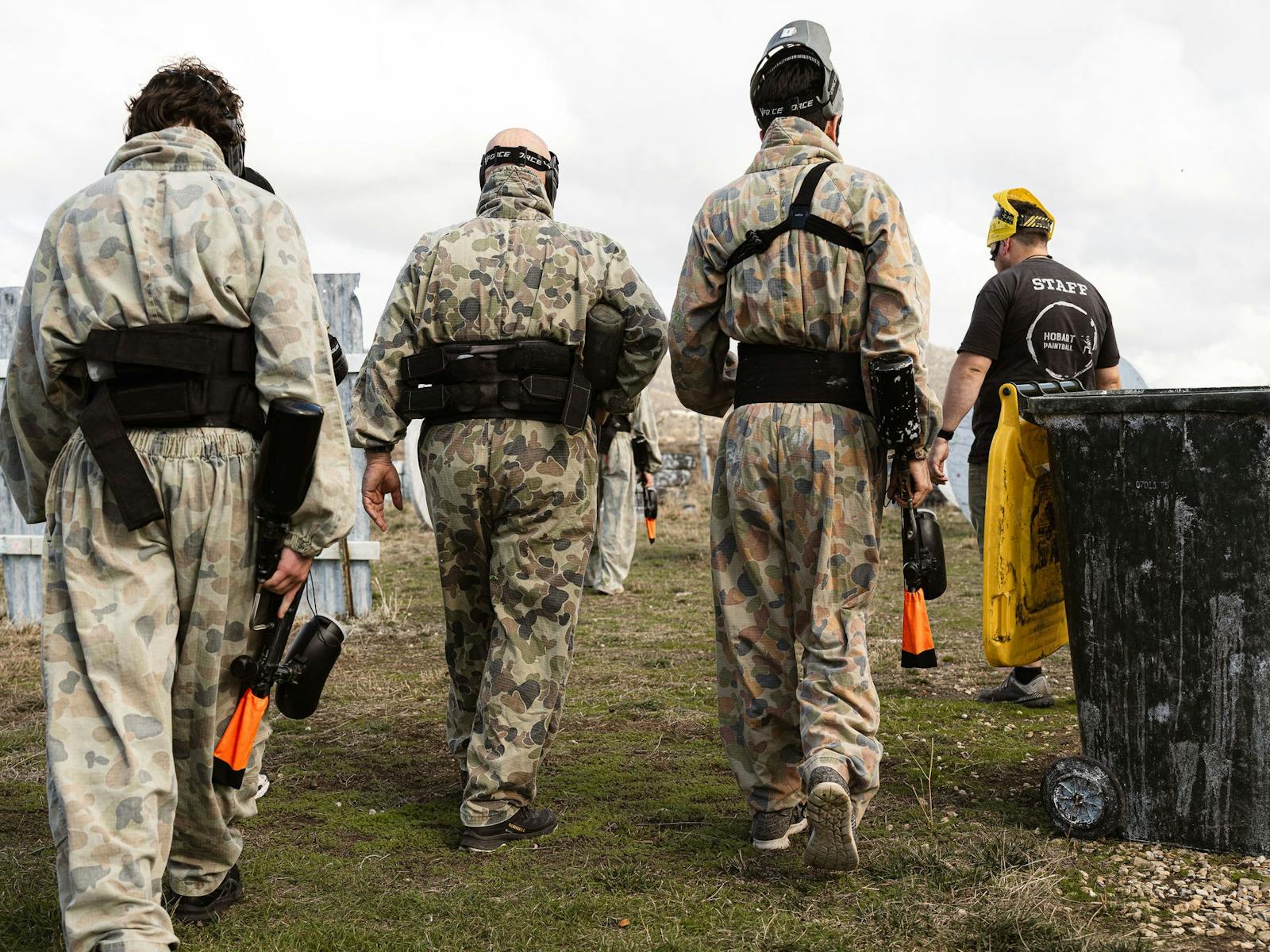 Referee about to commence a game with group