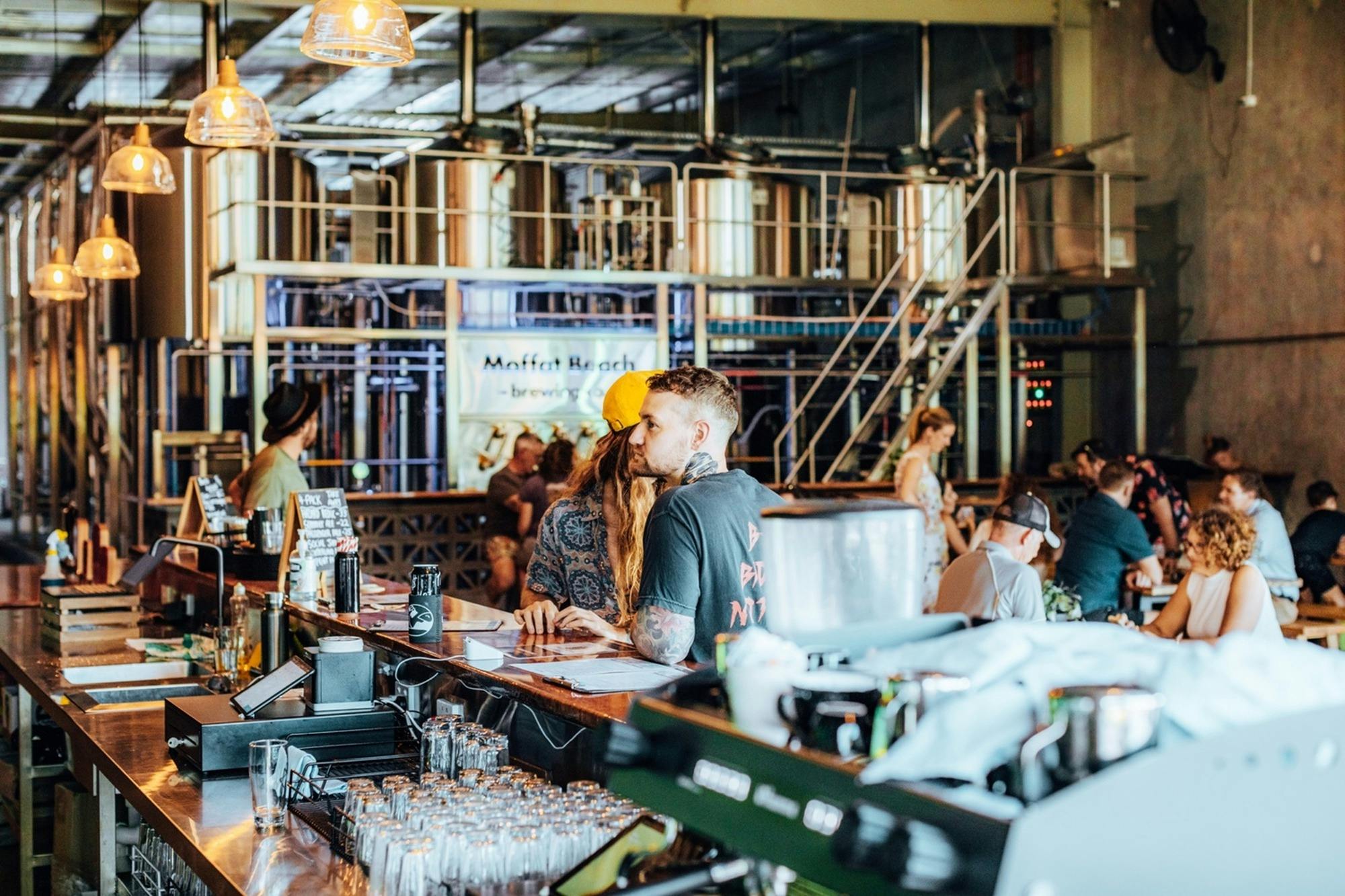 Enjoy award-winning beers just metres from the Moffat Beach Brewing Co brewhouse.