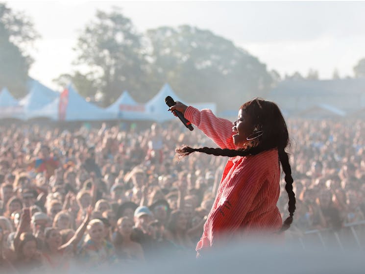 TKay Maidza performing to crowd on GTM outdoor stage