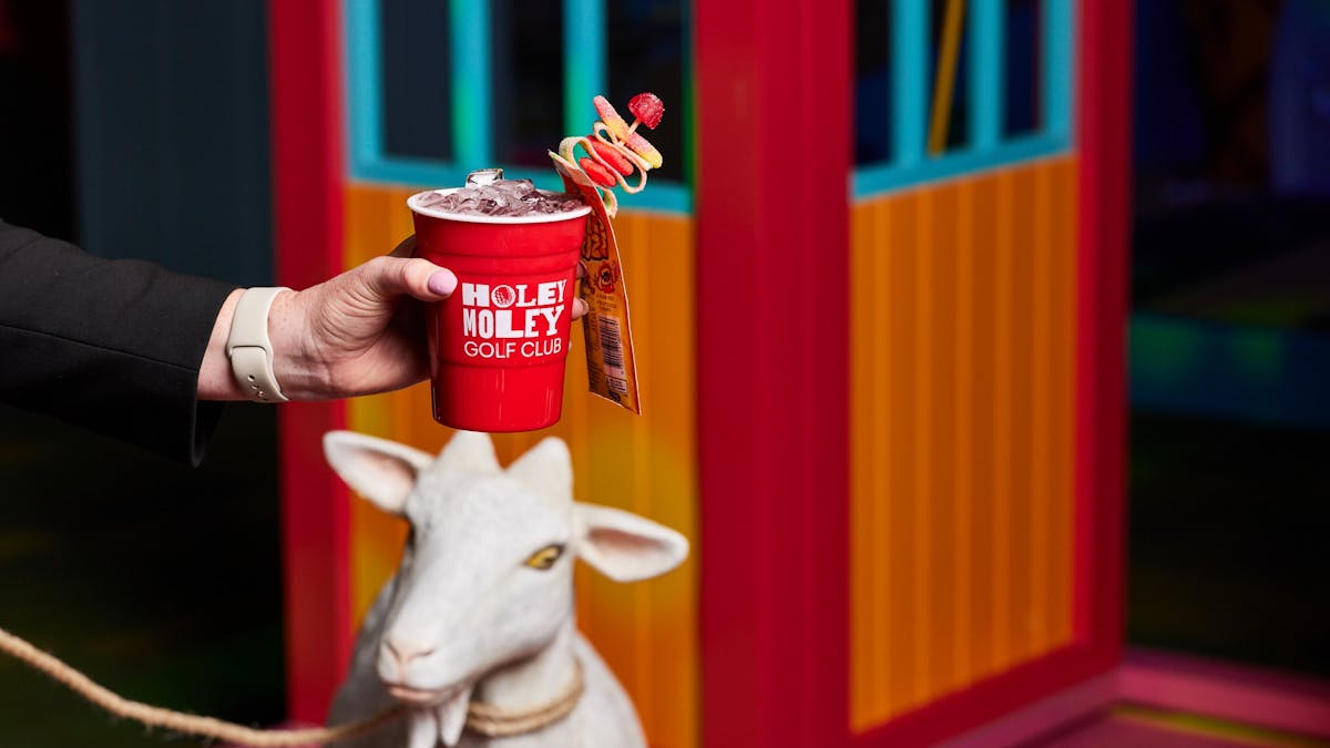 Grab your favourite cocktail at Holey Moley Chermside