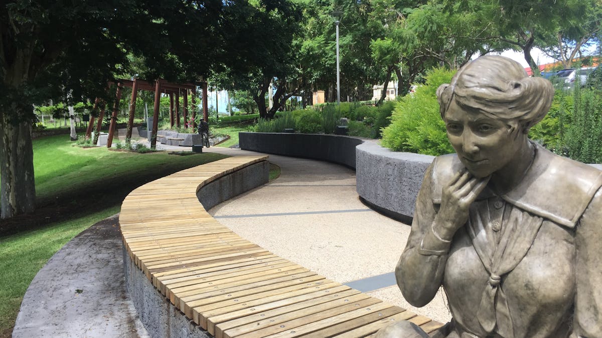 photo of statue of a woman sitting and staring blankly after reading a letter from the great war