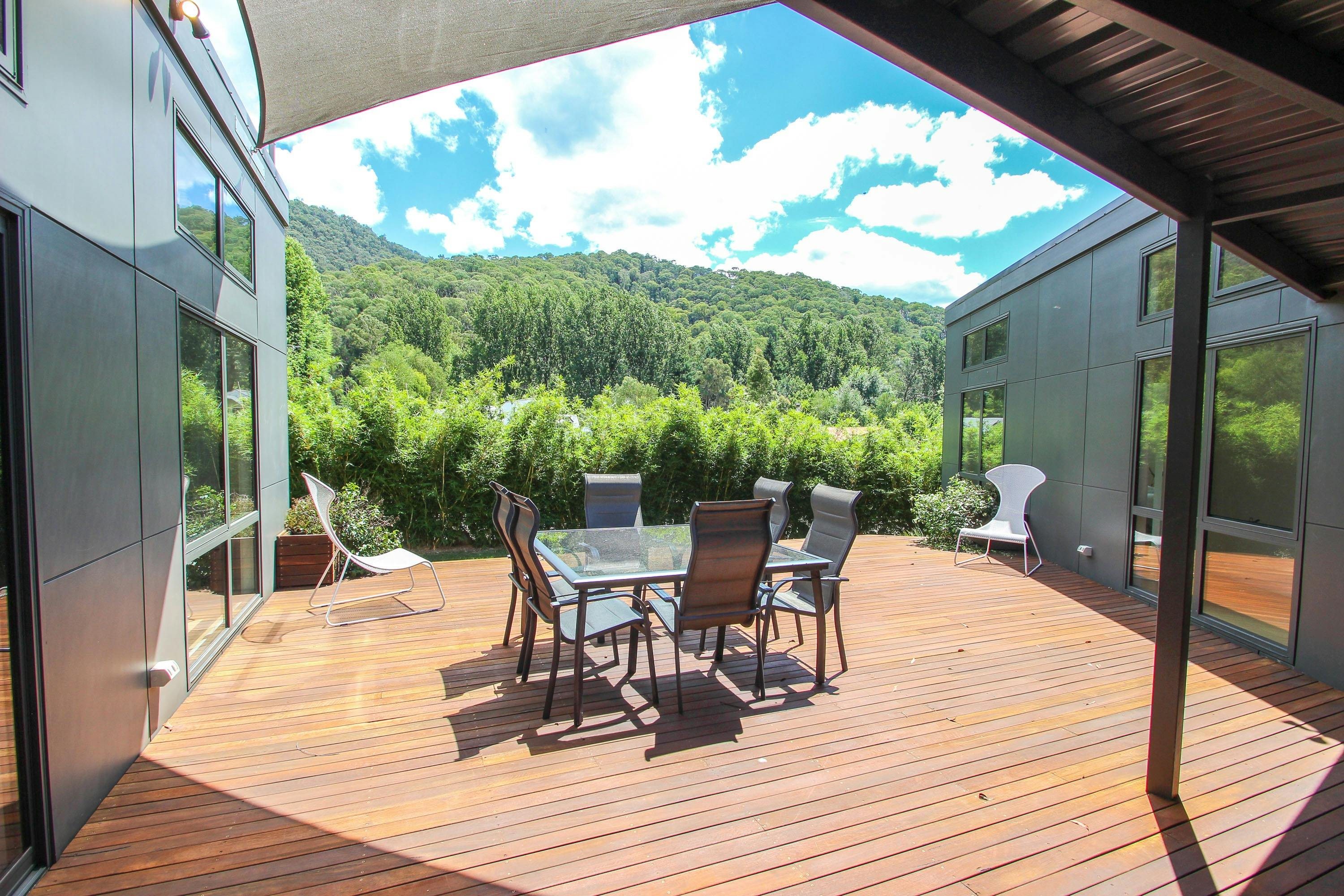 Alfresco area with barbeque and mountain views