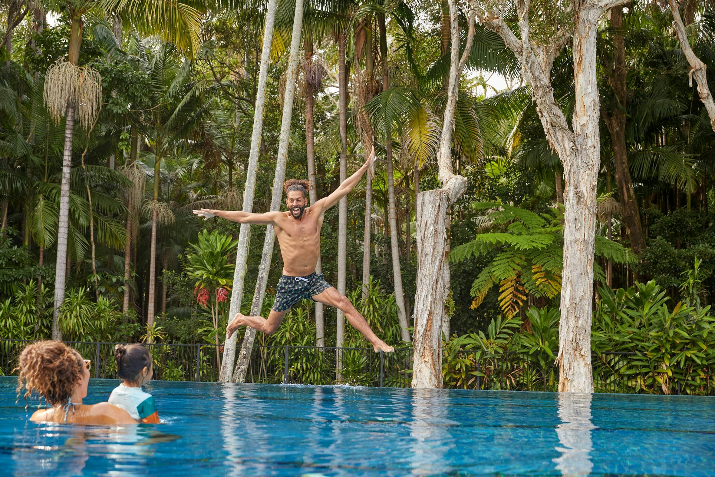 Family playing in the pool at Crystalbrook Byron