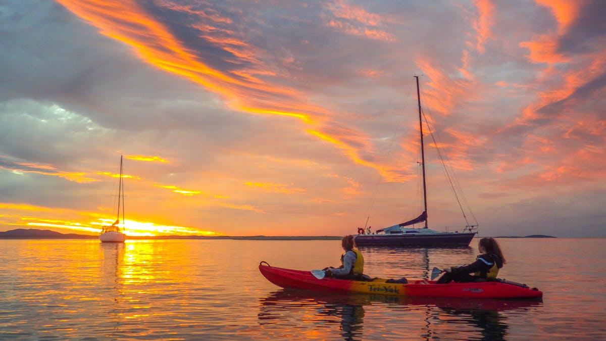 Watching an ocean sunset from a kayak in 1770