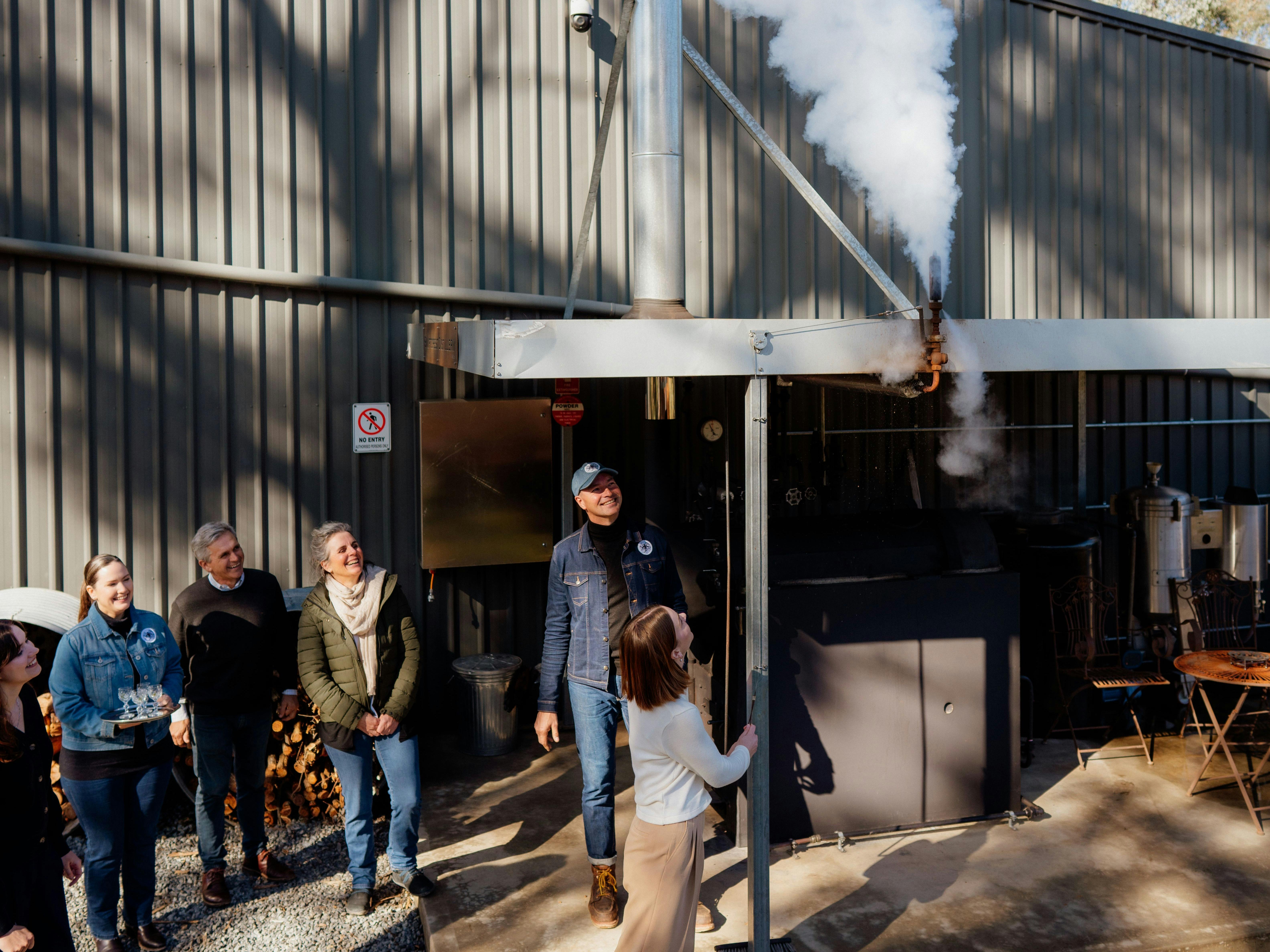 Guests experience the Swiftcrest Distillery cellar door tour and hands on experience .